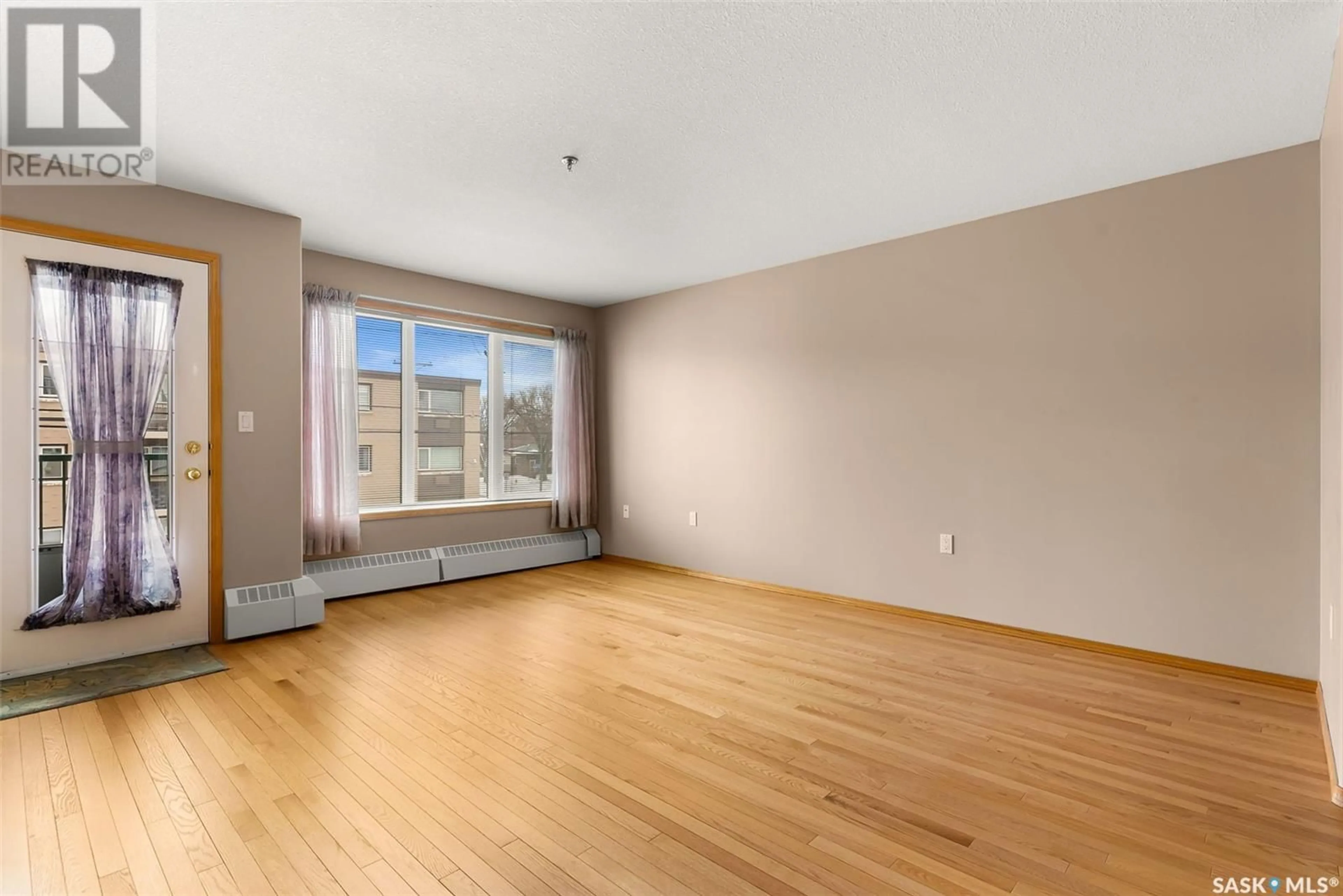 A pic of a room for 205 - 204 MCINTYRE STREET N, Regina Saskatchewan S4R3B7