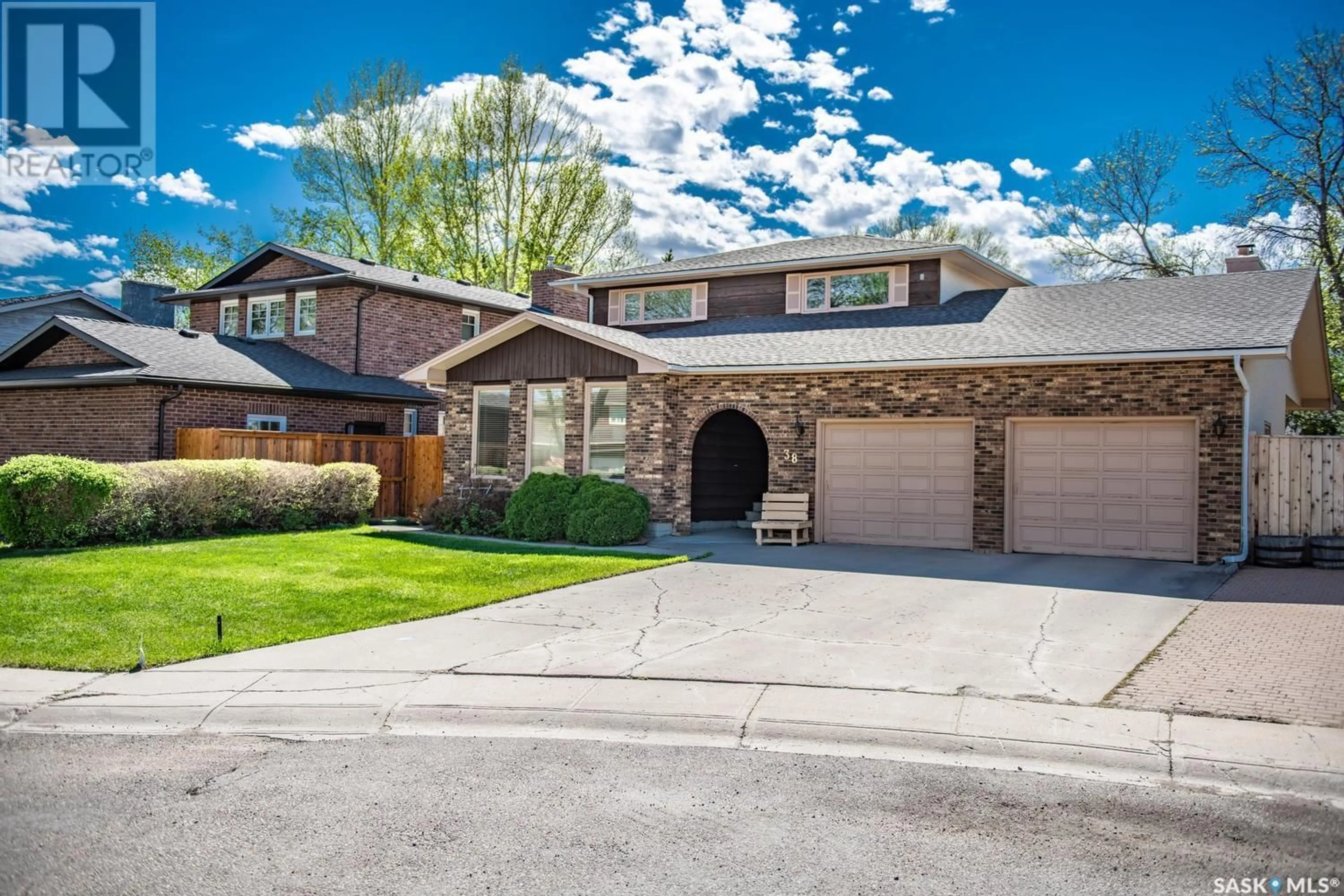 Home with brick exterior material, street for 38 MCGILL PLACE, Regina Saskatchewan S4S6R7