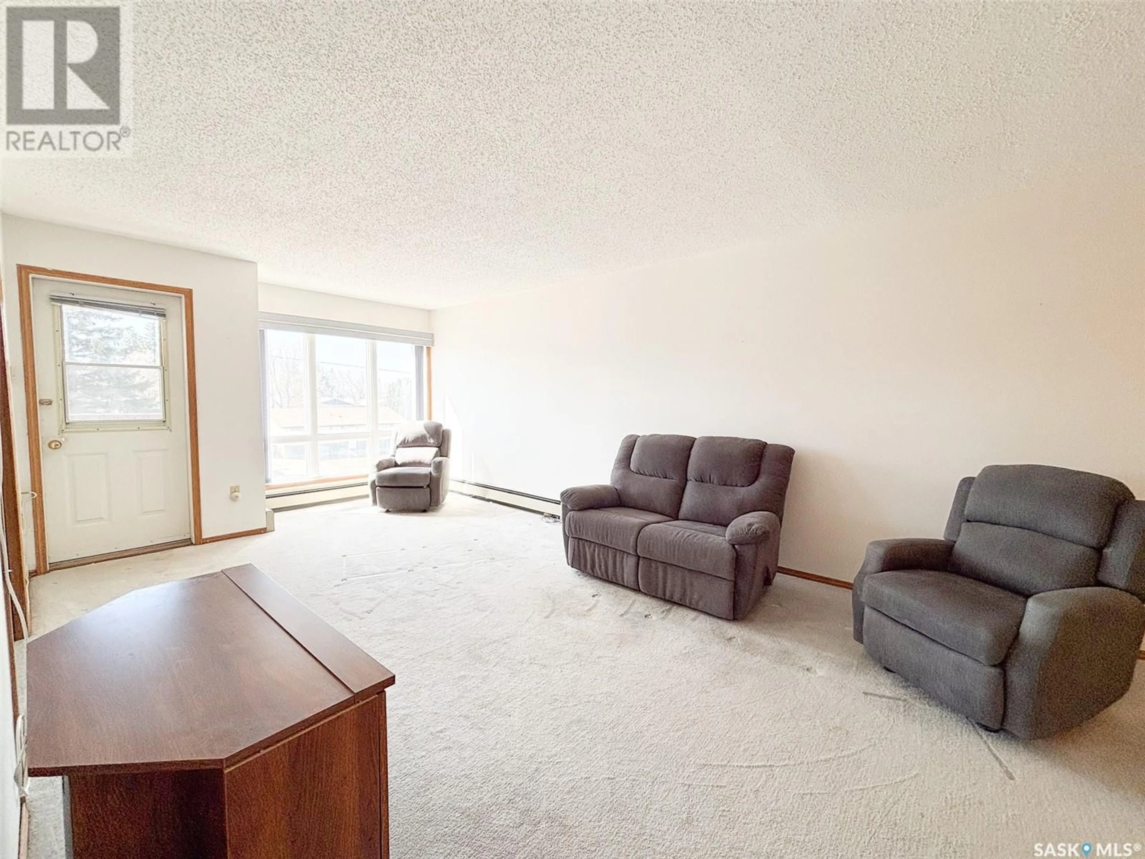 Living room with furniture, unknown for 205 - 3220 33RD STREET, Saskatoon Saskatchewan S7L6K3