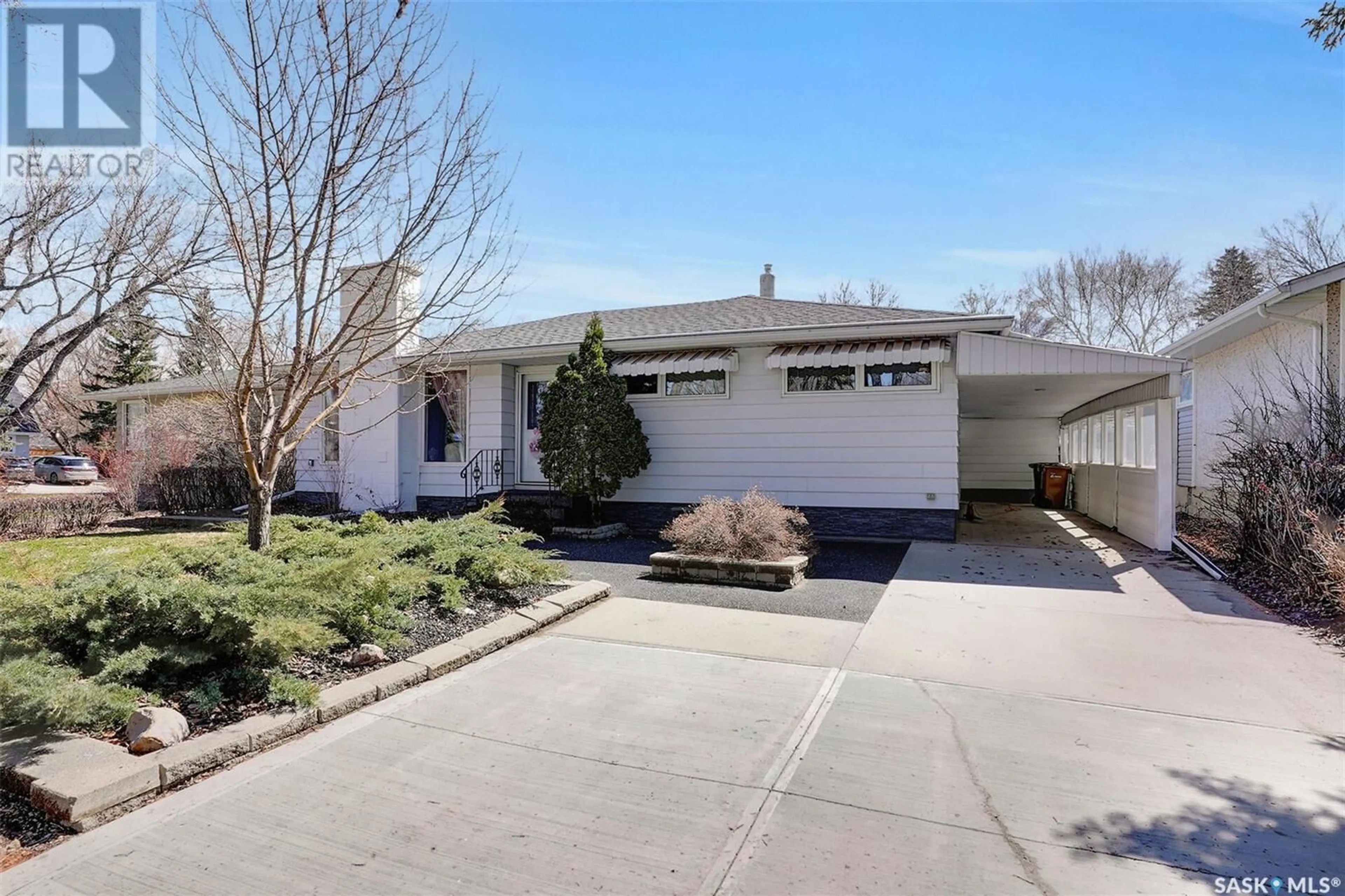 Home with vinyl exterior material, street for 3121 GRANT ROAD, Regina Saskatchewan S4S5G9