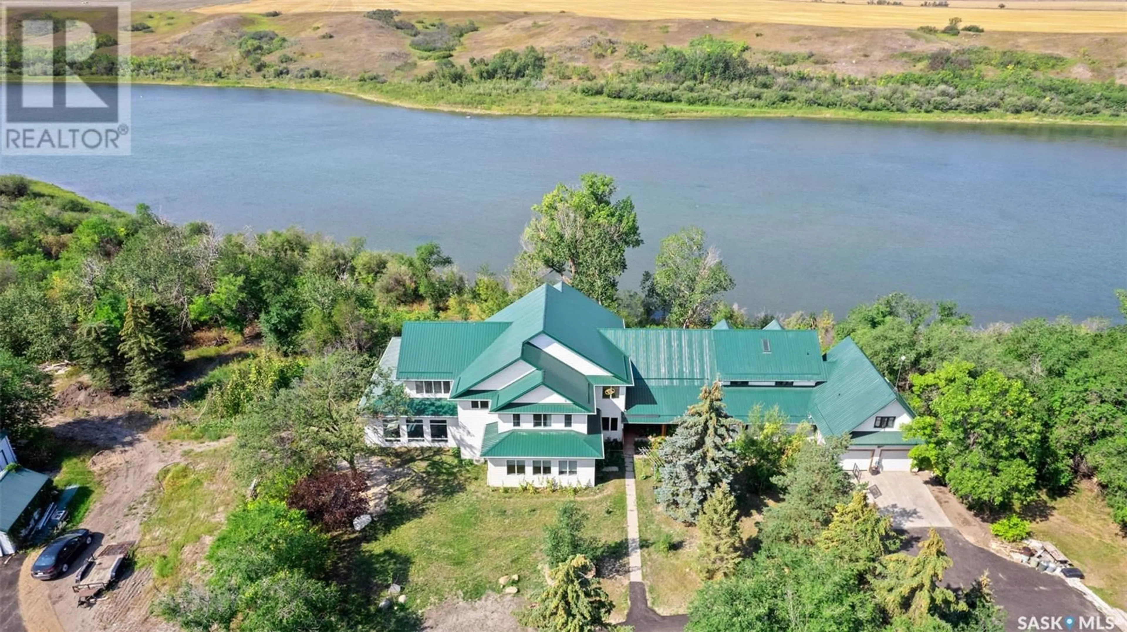 A pic from outside/outdoor area/front of a property/back of a property/a pic from drone, water/lake/river/ocean view for CAO RESIDENCE, Corman Park Rm No. 344 Saskatchewan S7K3J9