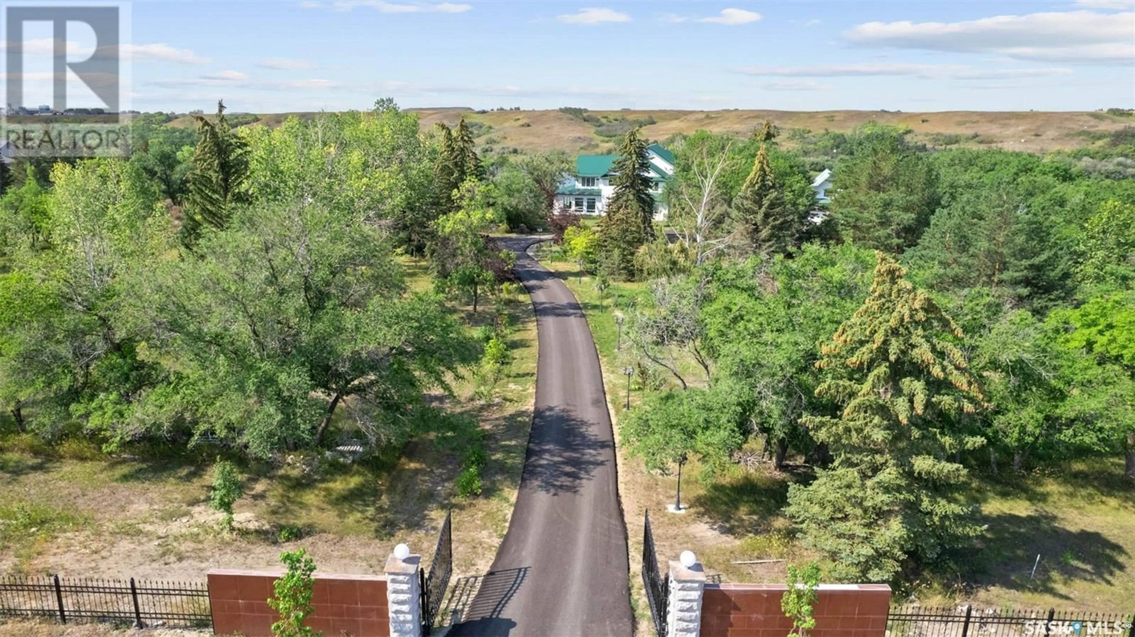 A pic from outside/outdoor area/front of a property/back of a property/a pic from drone, street for CAO RESIDENCE, Corman Park Rm No. 344 Saskatchewan S7K3J9