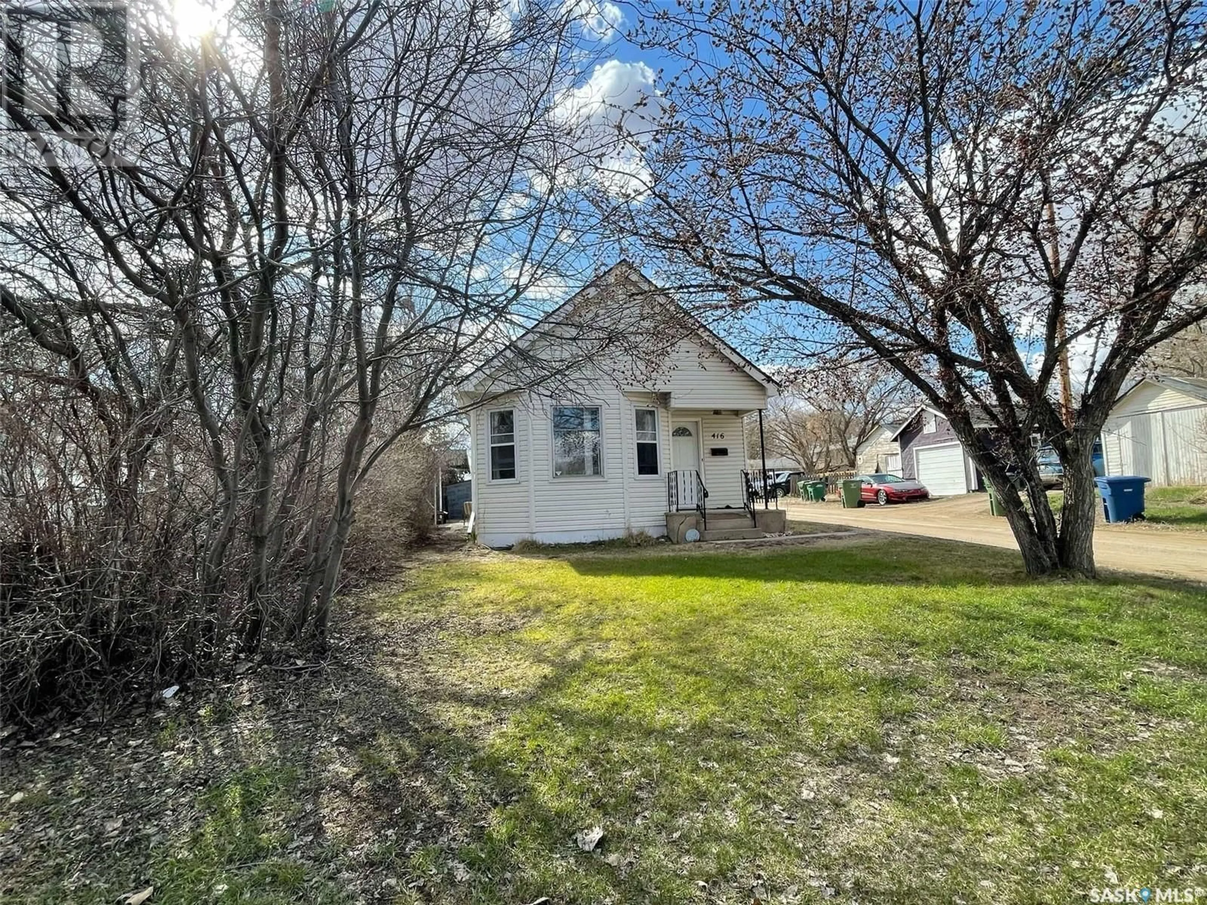 A pic from outside/outdoor area/front of a property/back of a property/a pic from drone, street for 416 10TH AVENUE, Moose Jaw Saskatchewan S6H4K5
