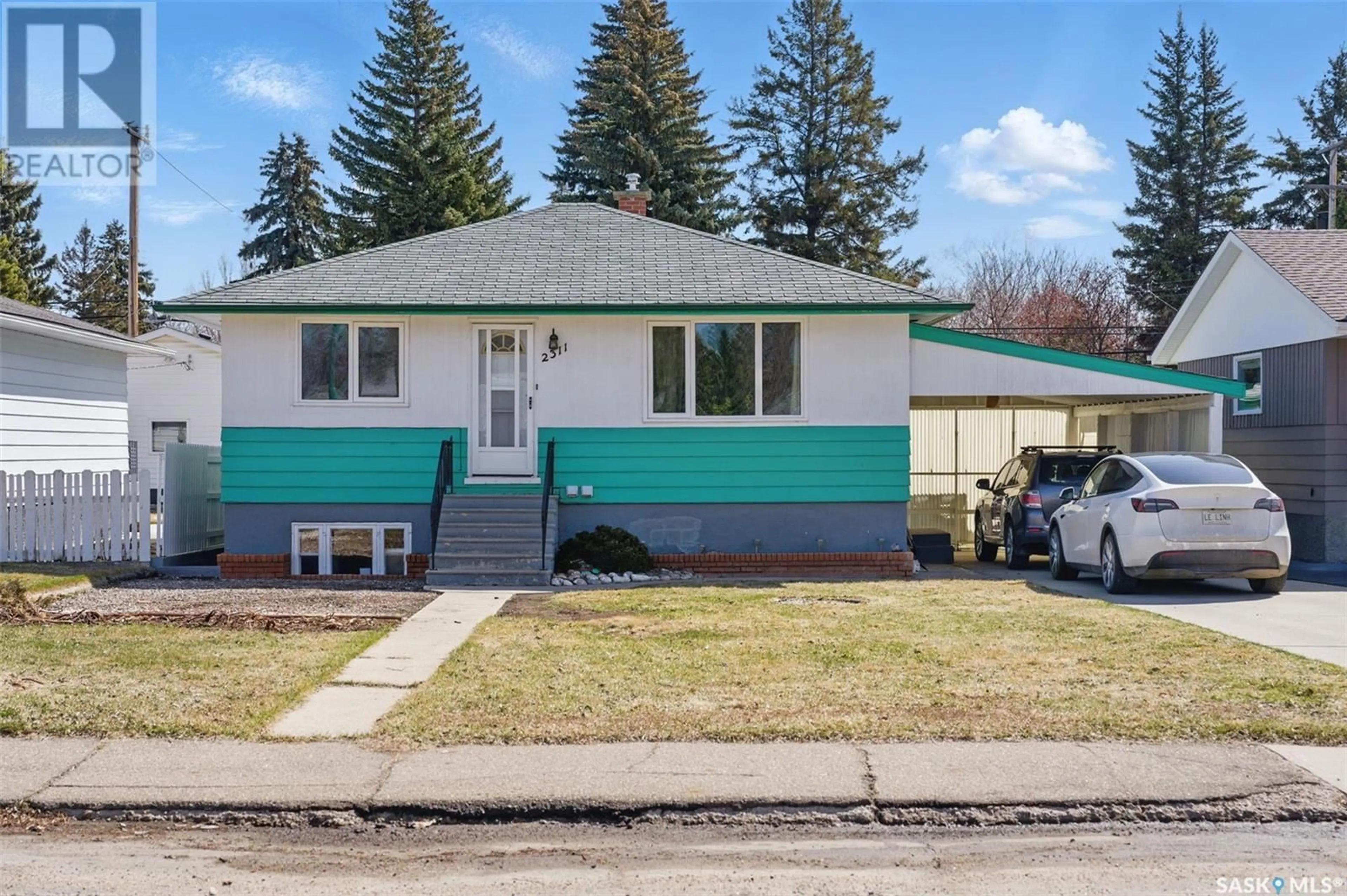 Home with vinyl exterior material, street for 2311 LANSDOWNE AVENUE, Saskatoon Saskatchewan S7J1G8