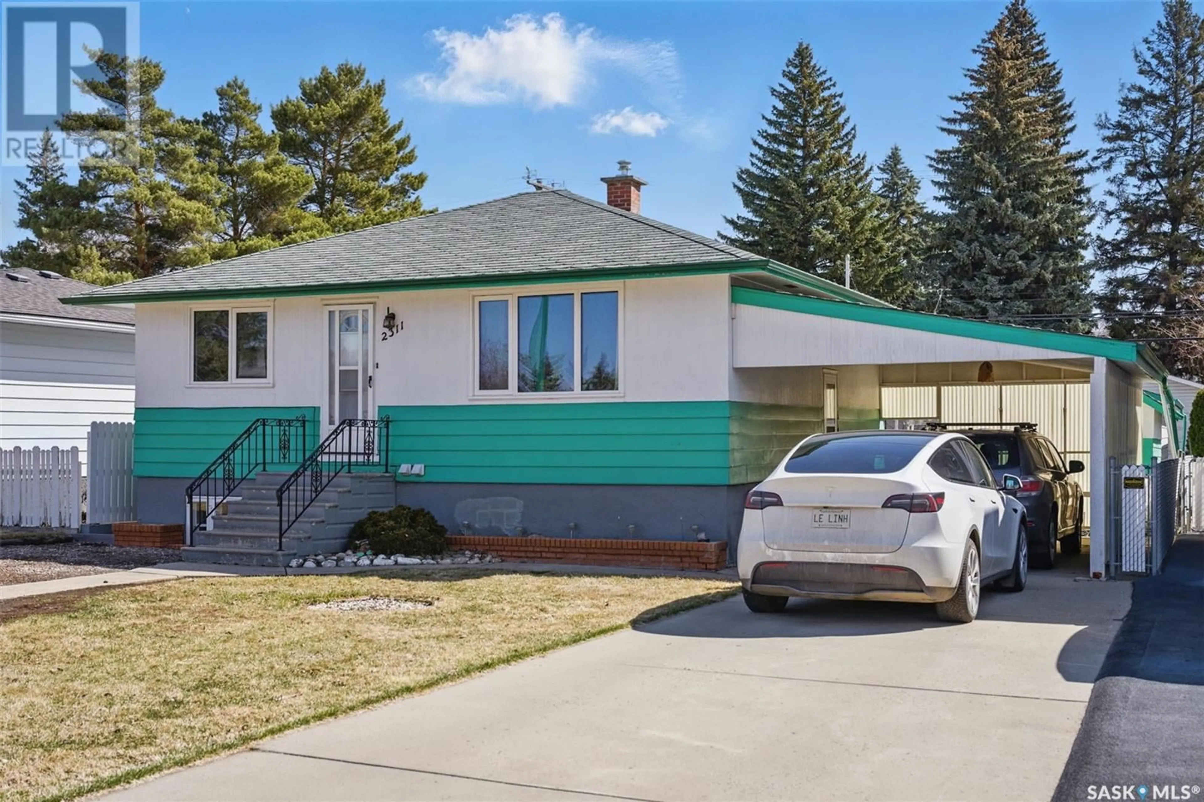 Home with vinyl exterior material, street for 2311 LANSDOWNE AVENUE, Saskatoon Saskatchewan S7J1G8