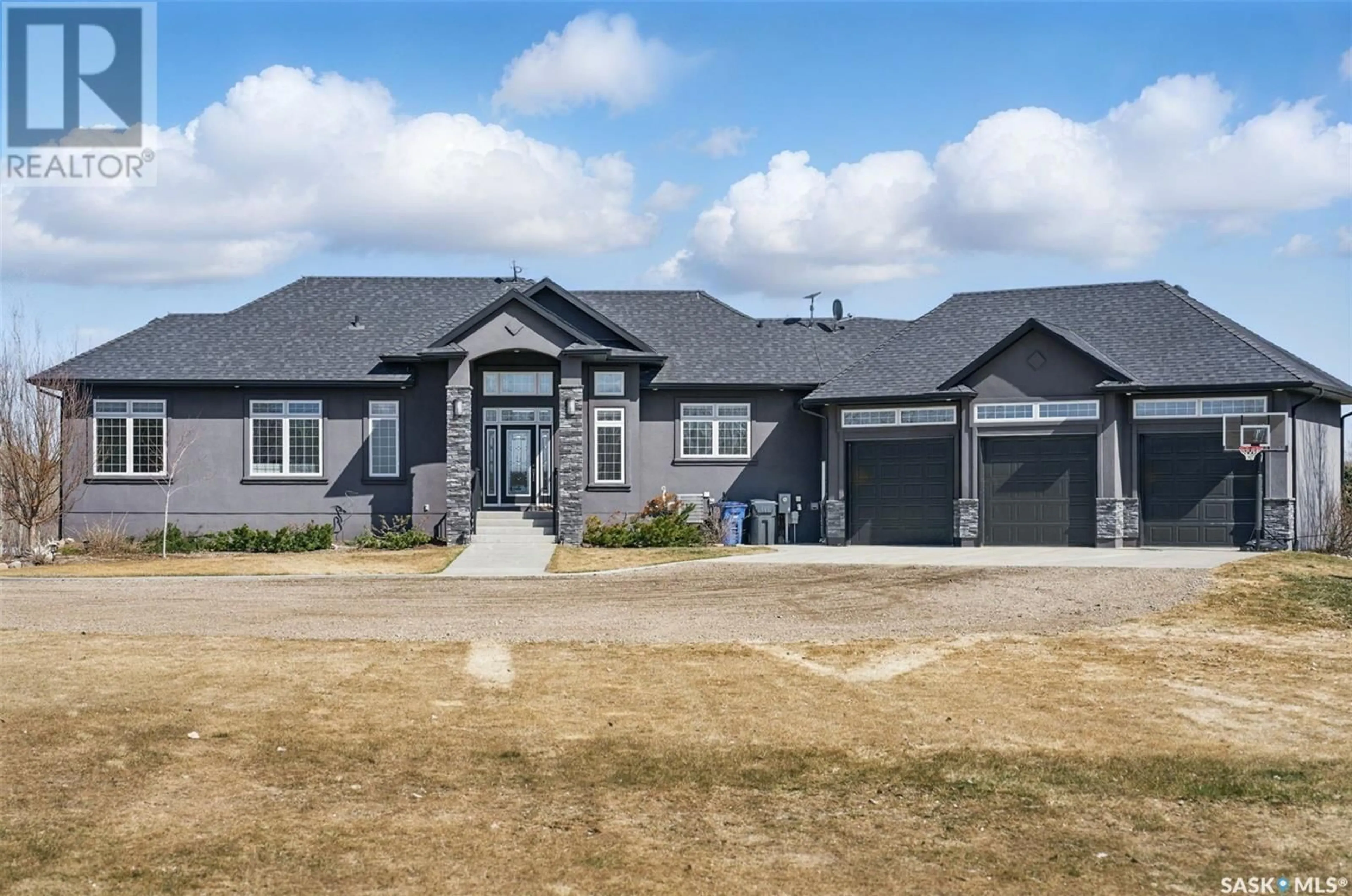 Home with vinyl exterior material, street for 24 SUNRISE DRIVE, Blackstrap Skyview Saskatchewan S7C0A6
