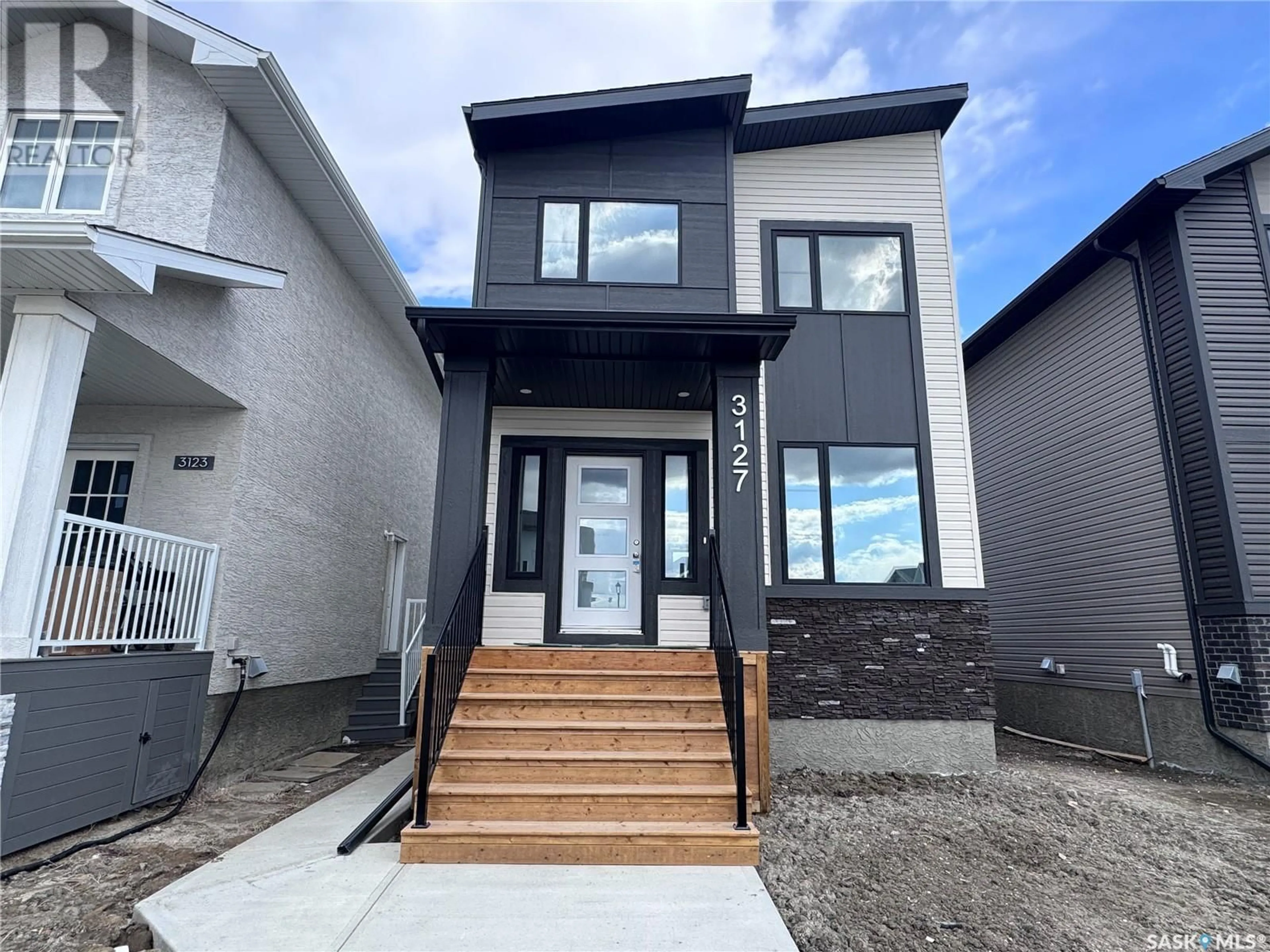 Home with vinyl exterior material, street for 3127 GREEN BROOK ROAD, Regina Saskatchewan S4V3R8