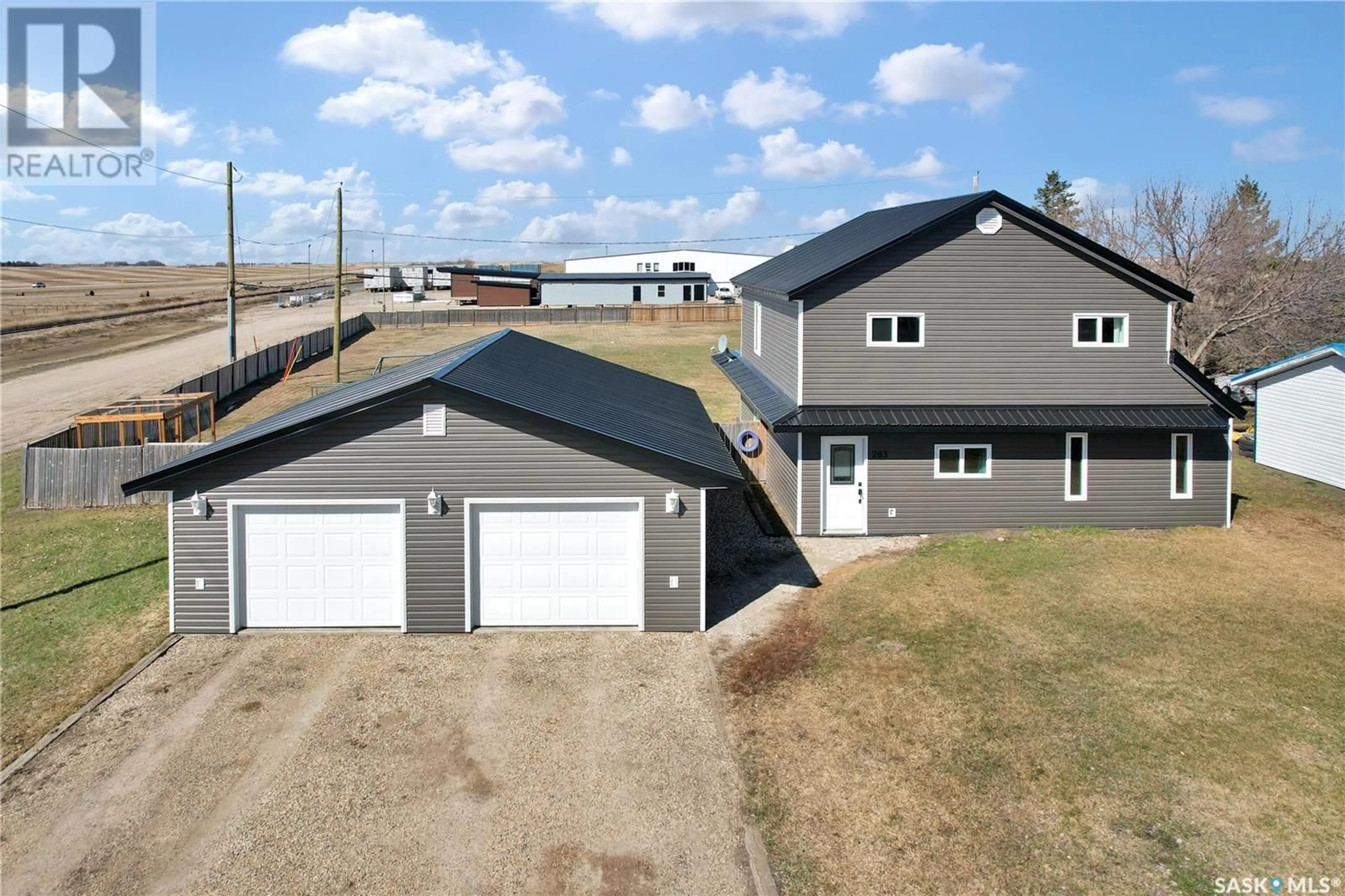 A pic from outside/outdoor area/front of a property/back of a property/a pic from drone, building for 203 LEREW STREET, Vonda Saskatchewan S0K4N0
