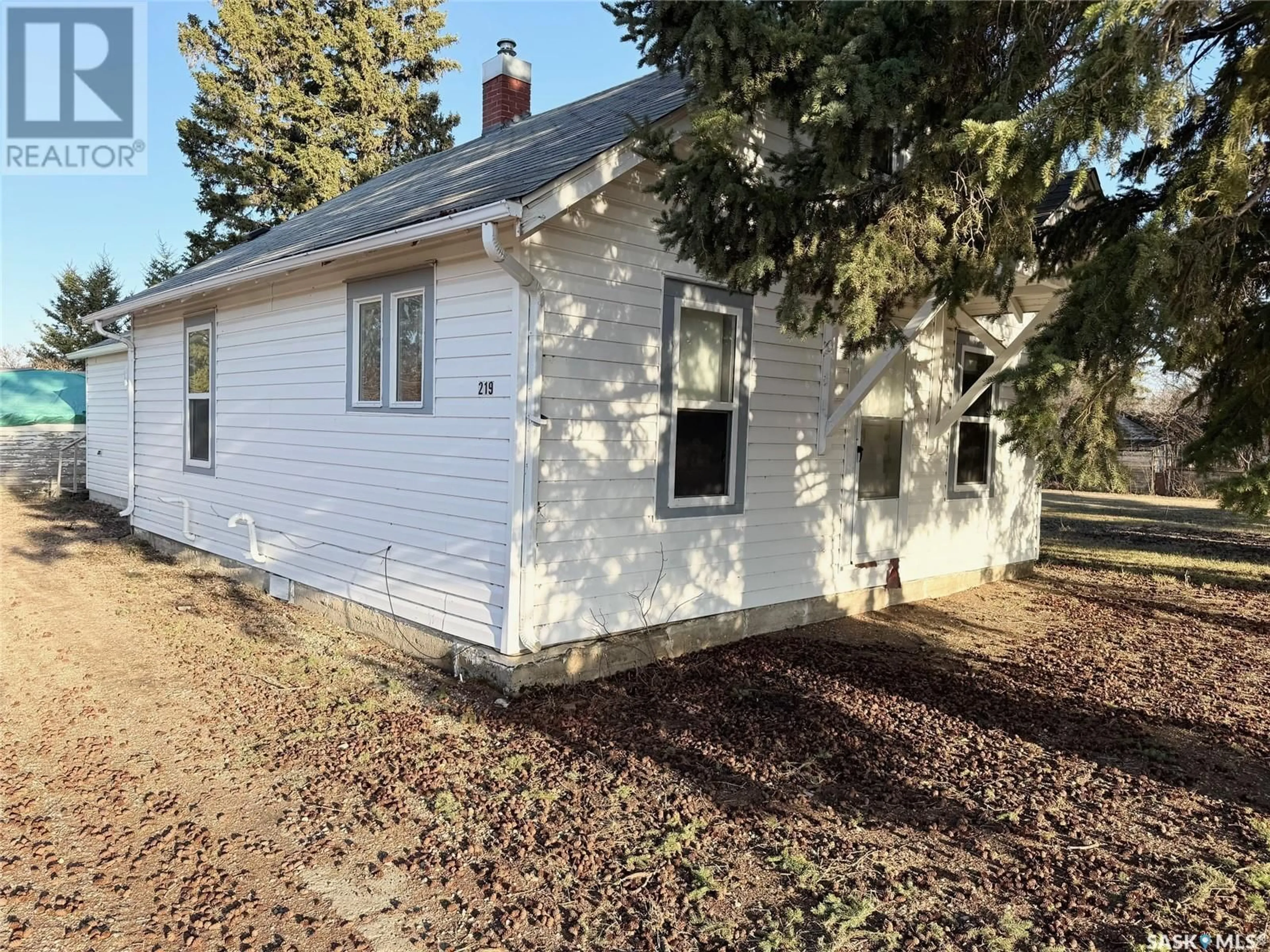 Home with vinyl exterior material, street for 219 2ND AVENUE, Spalding Saskatchewan S0K4C0