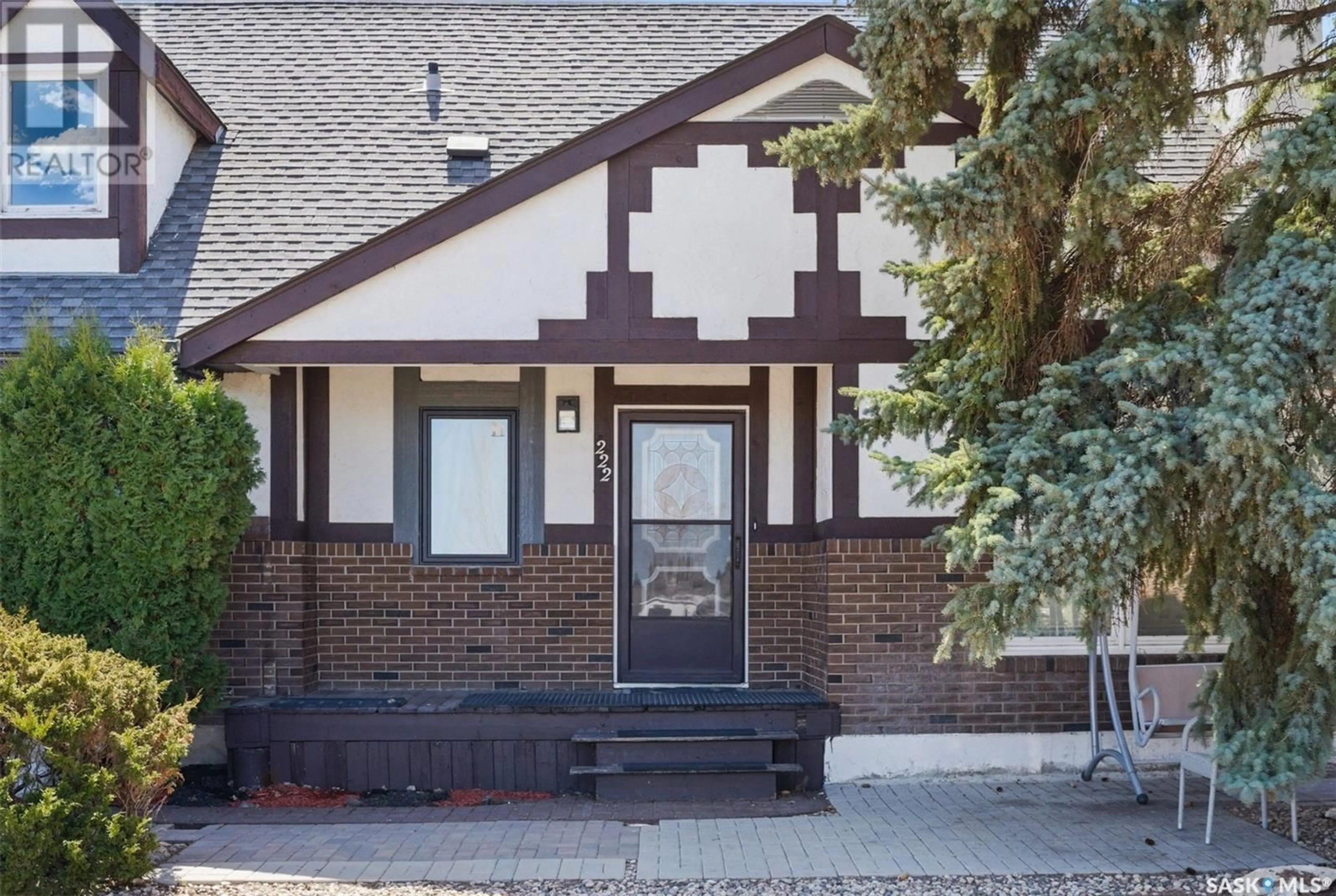 Home with brick exterior material, street for 222 AVONDALE ROAD, Saskatoon Saskatchewan S7H5C7