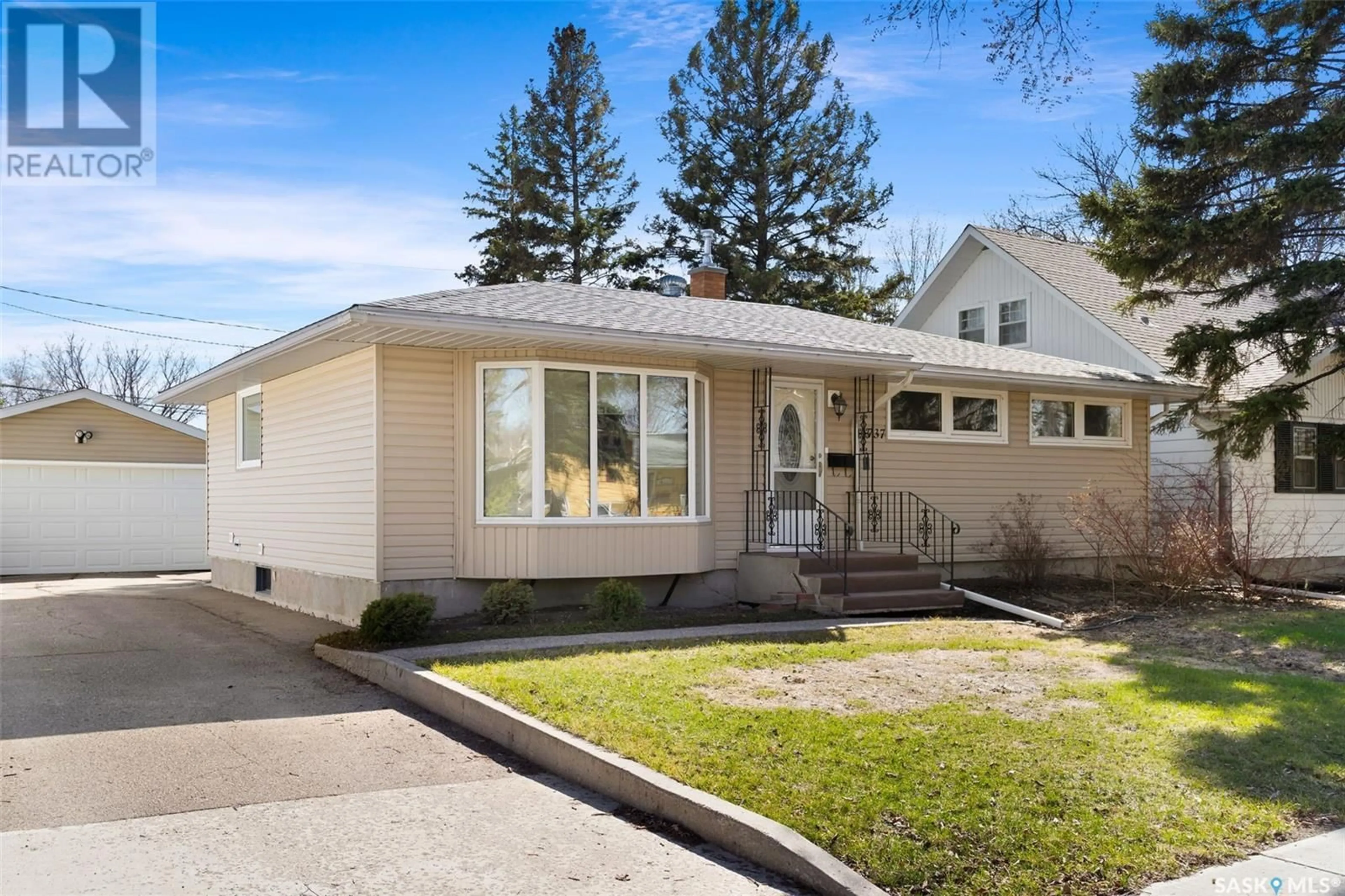 Home with vinyl exterior material, street for 1737 UHRICH AVENUE, Regina Saskatchewan S4S4R6