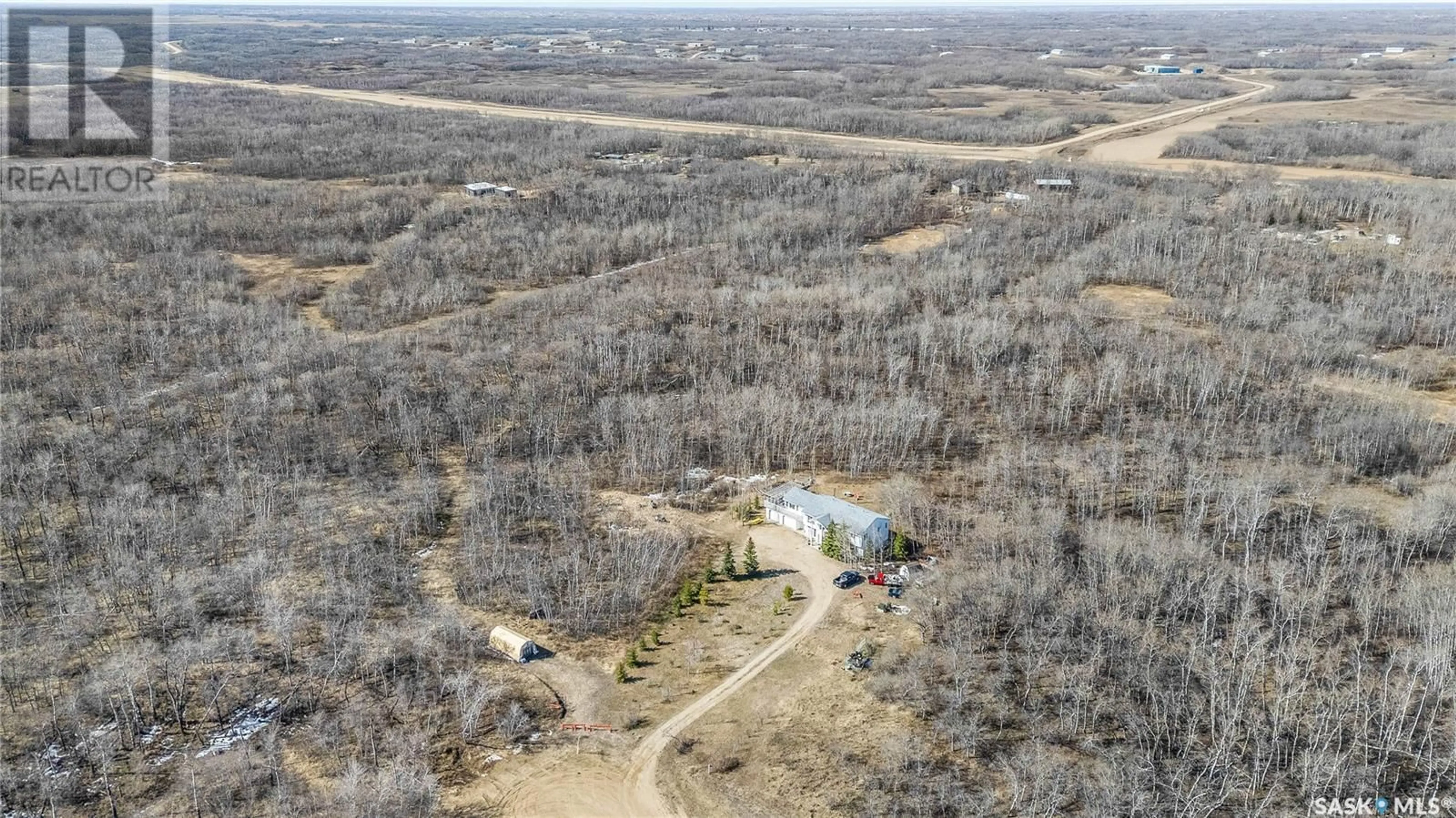 A pic from outside/outdoor area/front of a property/back of a property/a pic from drone, forest/trees view for 6 MERCIER PLACE, Dundurn Rm No. 314 Saskatchewan S7C0C9