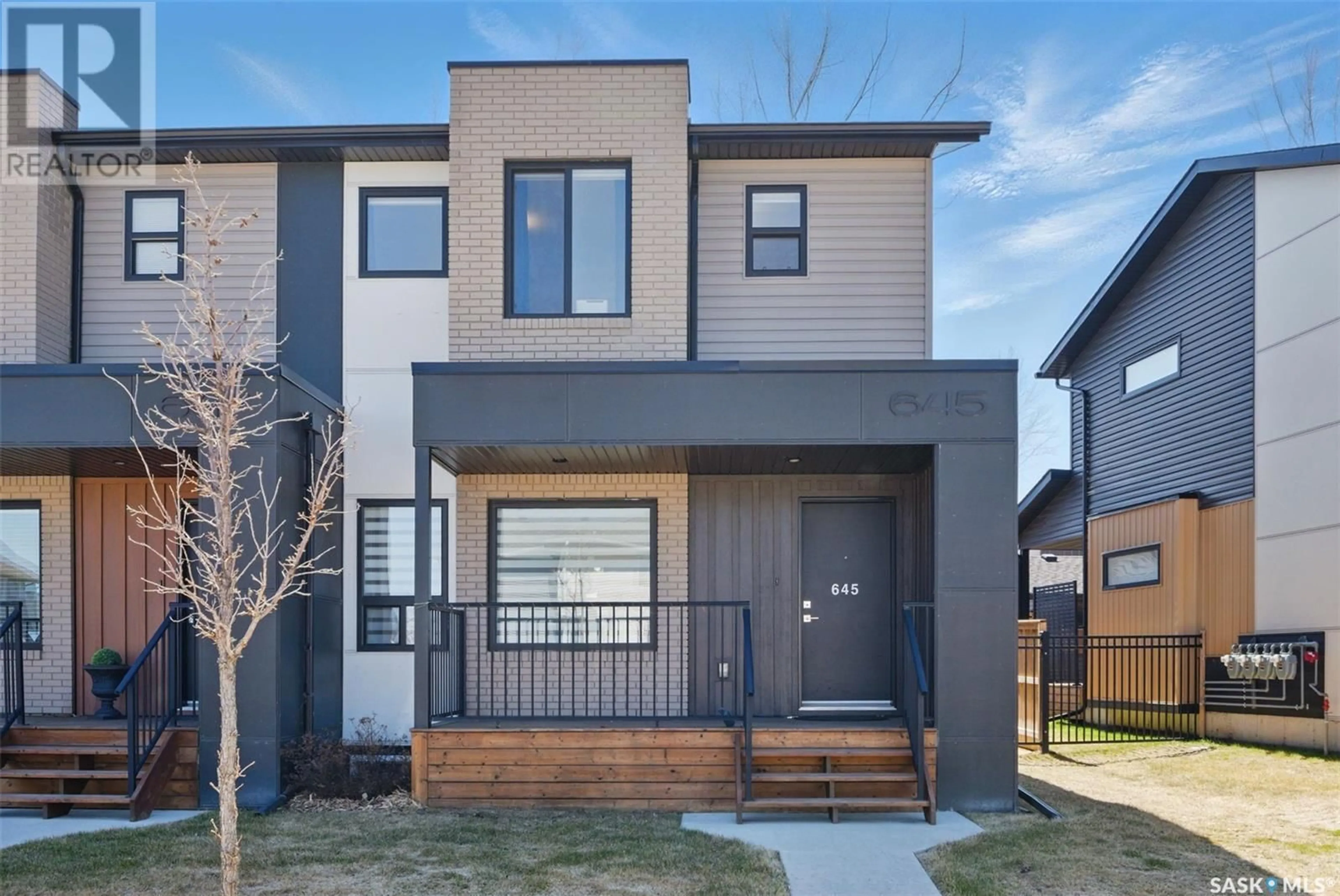 Home with brick exterior material, street for 645 EVERGREEN BOULEVARD, Saskatoon Saskatchewan S7W0L4