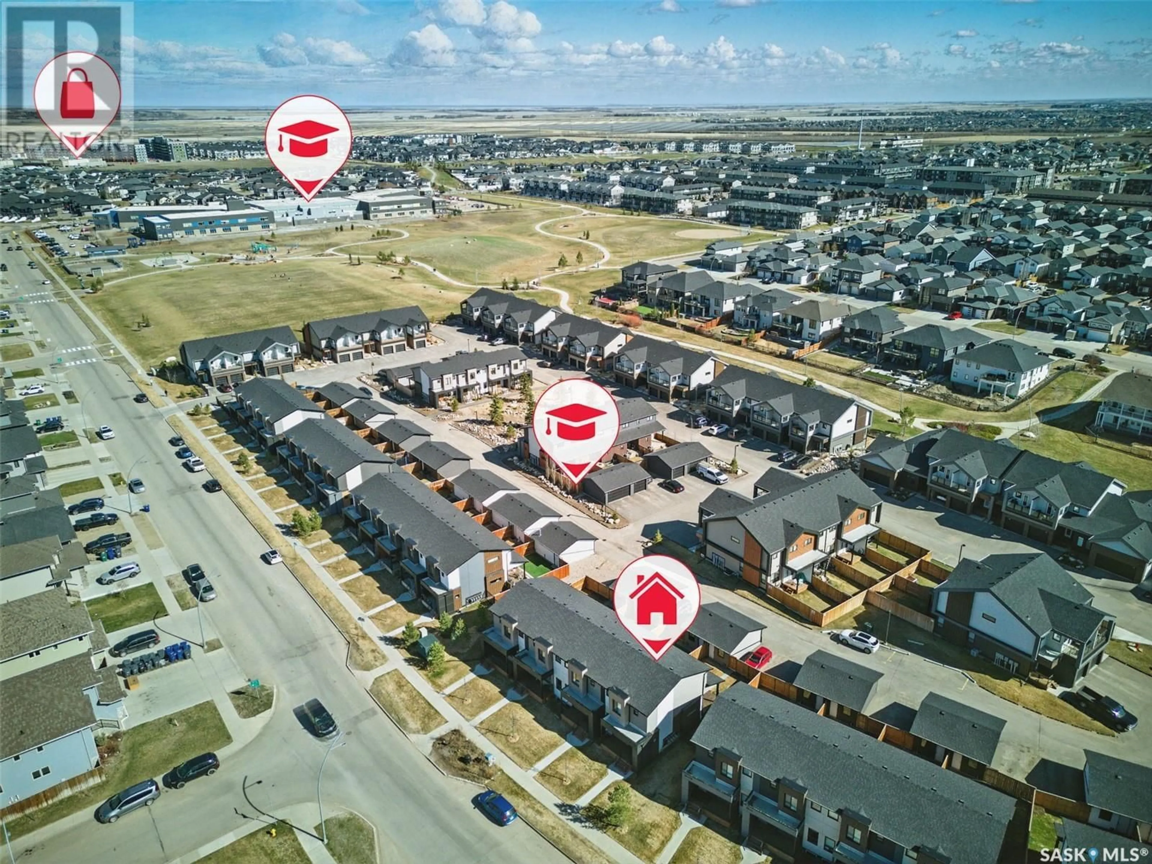 A pic from outside/outdoor area/front of a property/back of a property/a pic from drone, street for 645 EVERGREEN BOULEVARD, Saskatoon Saskatchewan S7W0L4