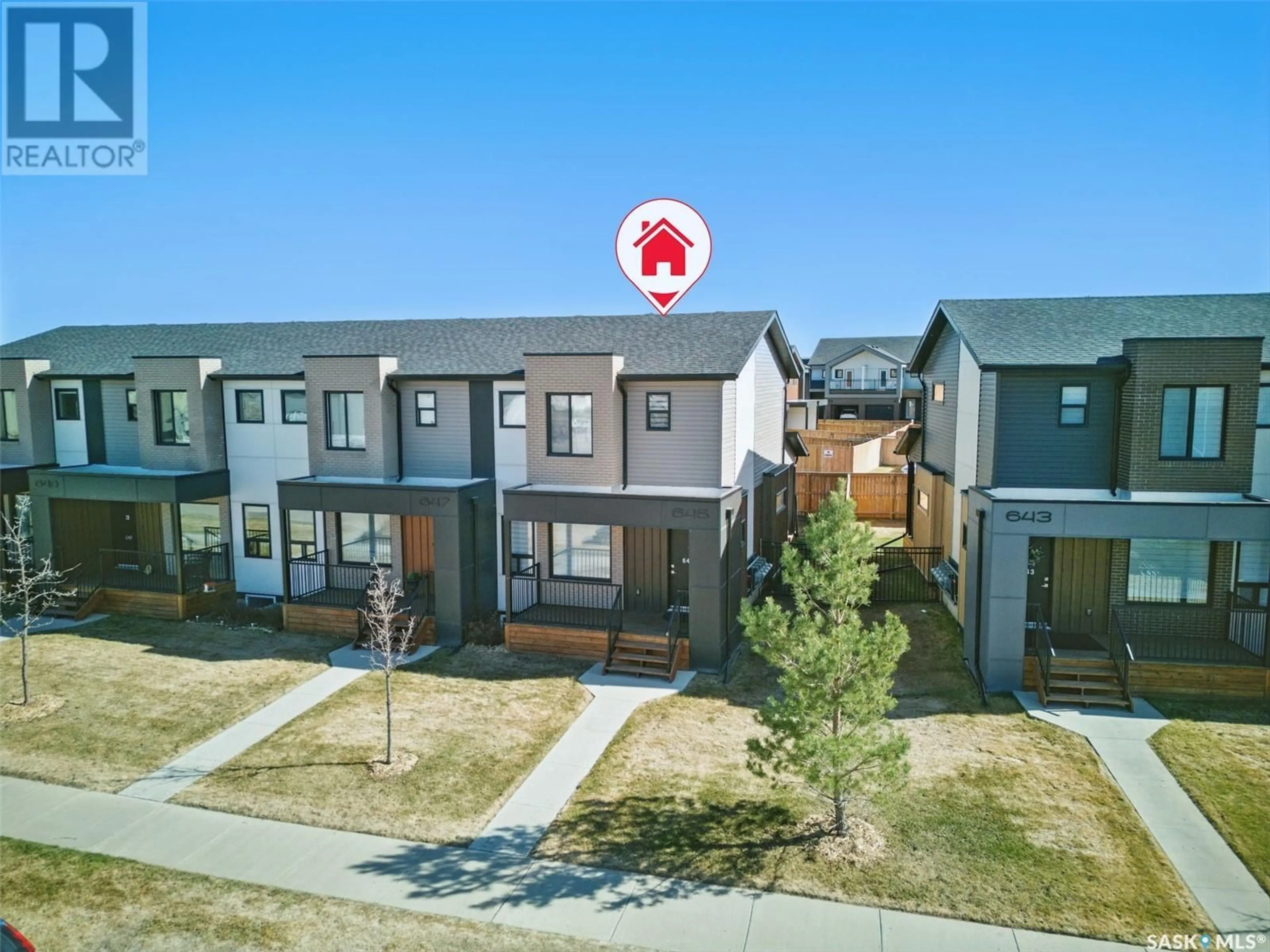 A pic from outside/outdoor area/front of a property/back of a property/a pic from drone, street for 645 EVERGREEN BOULEVARD, Saskatoon Saskatchewan S7W0L4