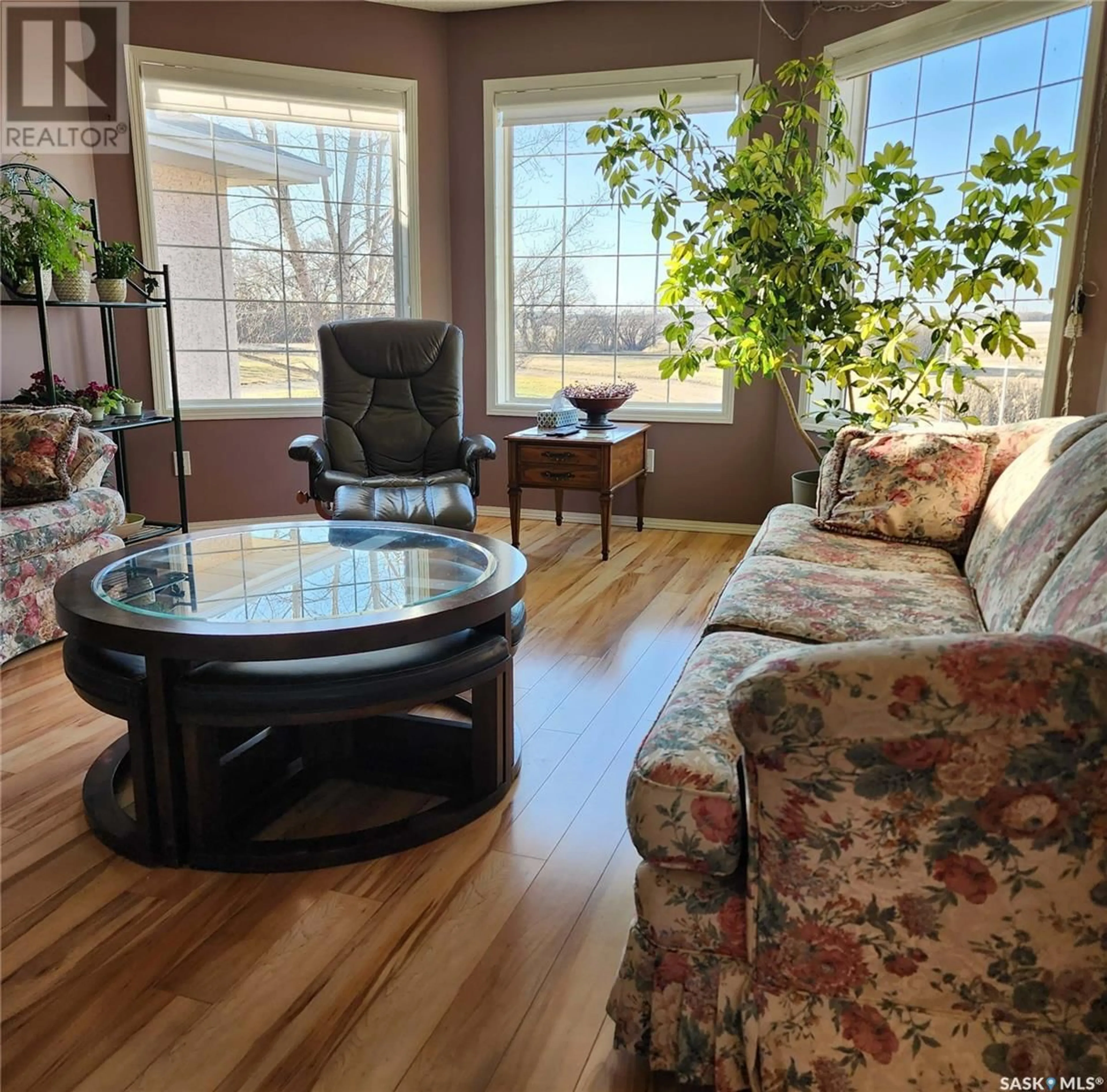 Living room with furniture, wood/laminate floor for 113 WIND RIVER ESTATES, Clavet Saskatchewan S0K0Y0