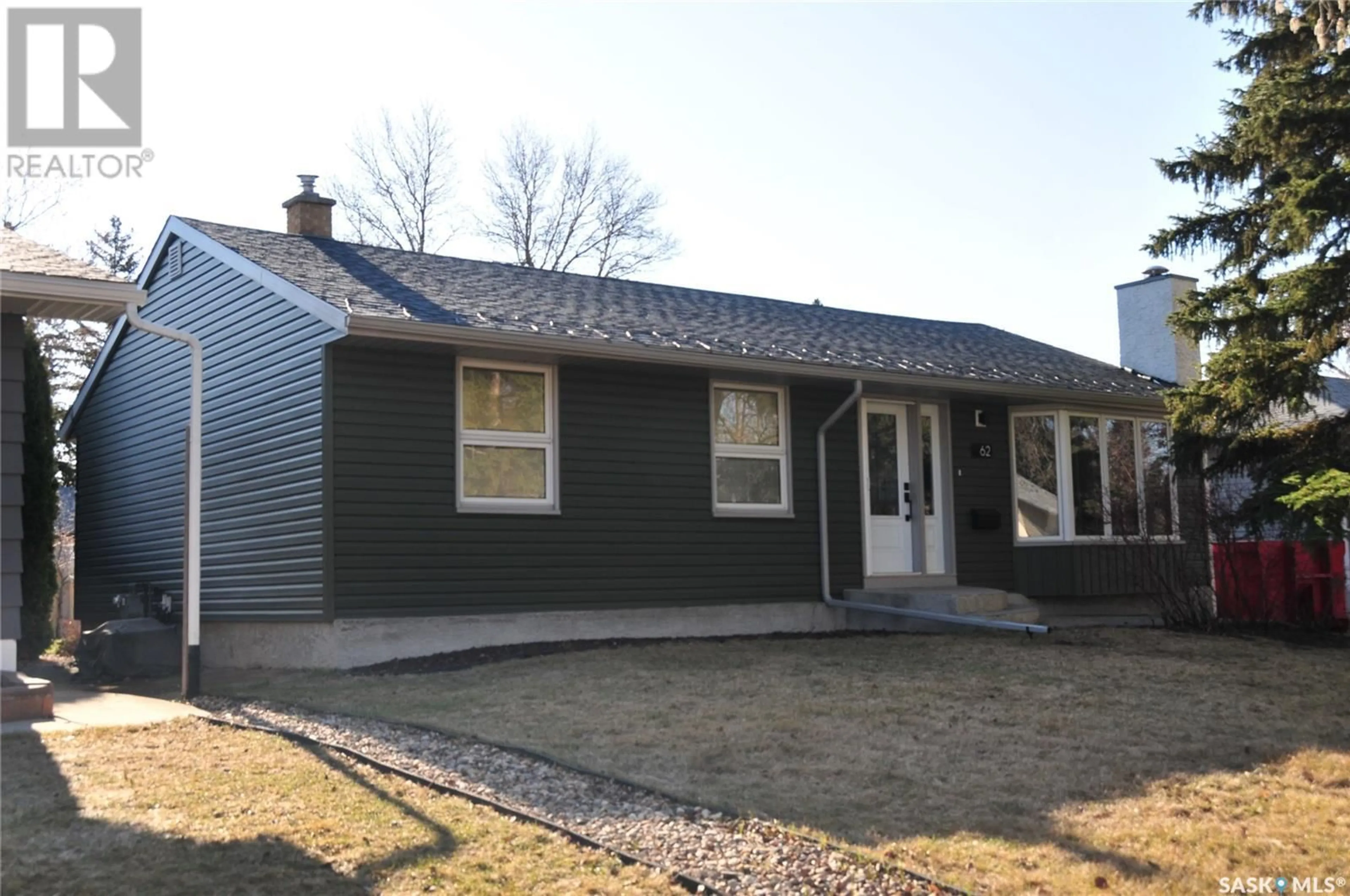 Home with vinyl exterior material, street for 62 HAULTAIN CRESCENT, Regina Saskatchewan S4S4B5