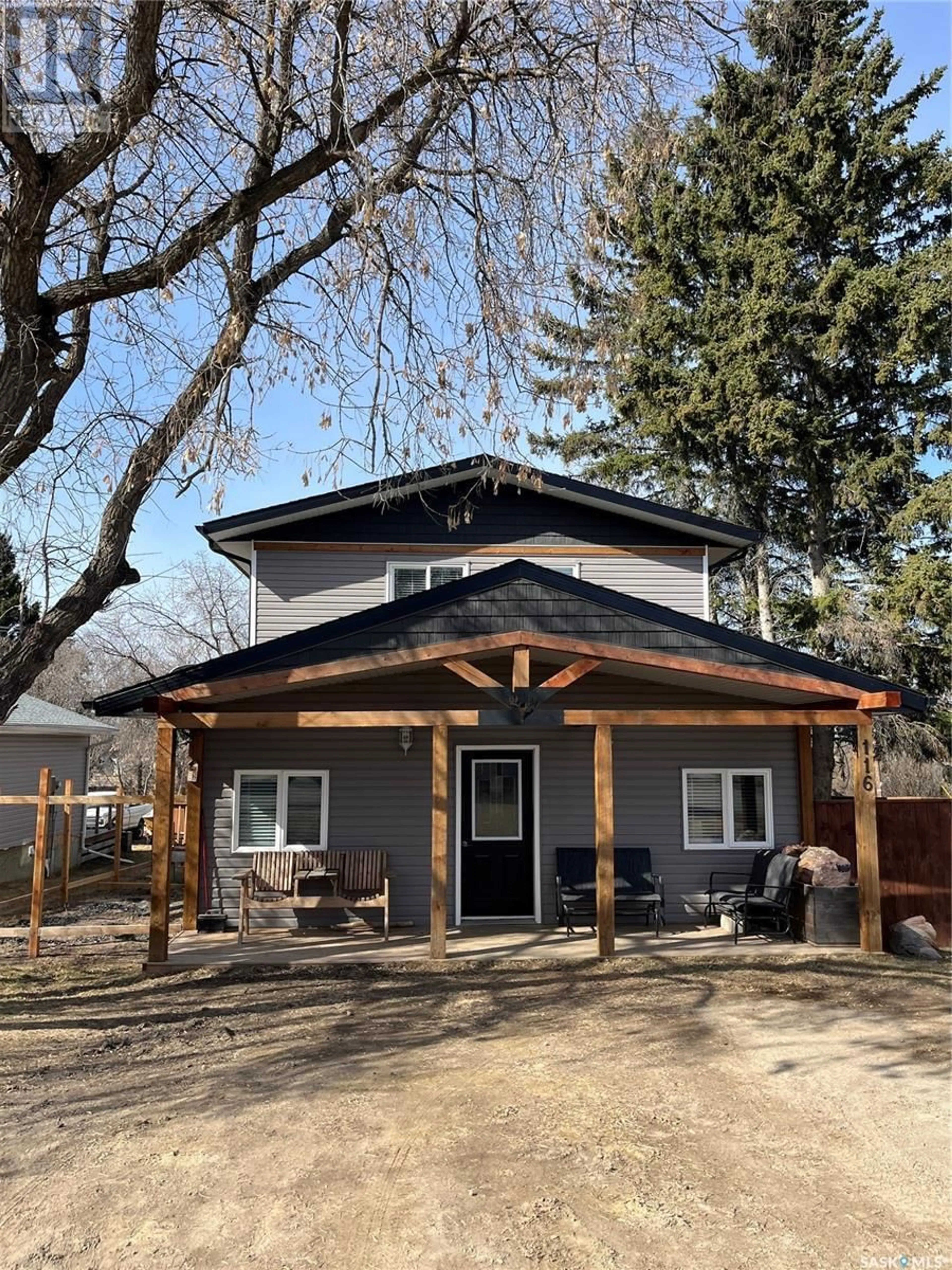 Home with vinyl exterior material, street for 116 2ND AVENUE, Big River Saskatchewan S0J0E0