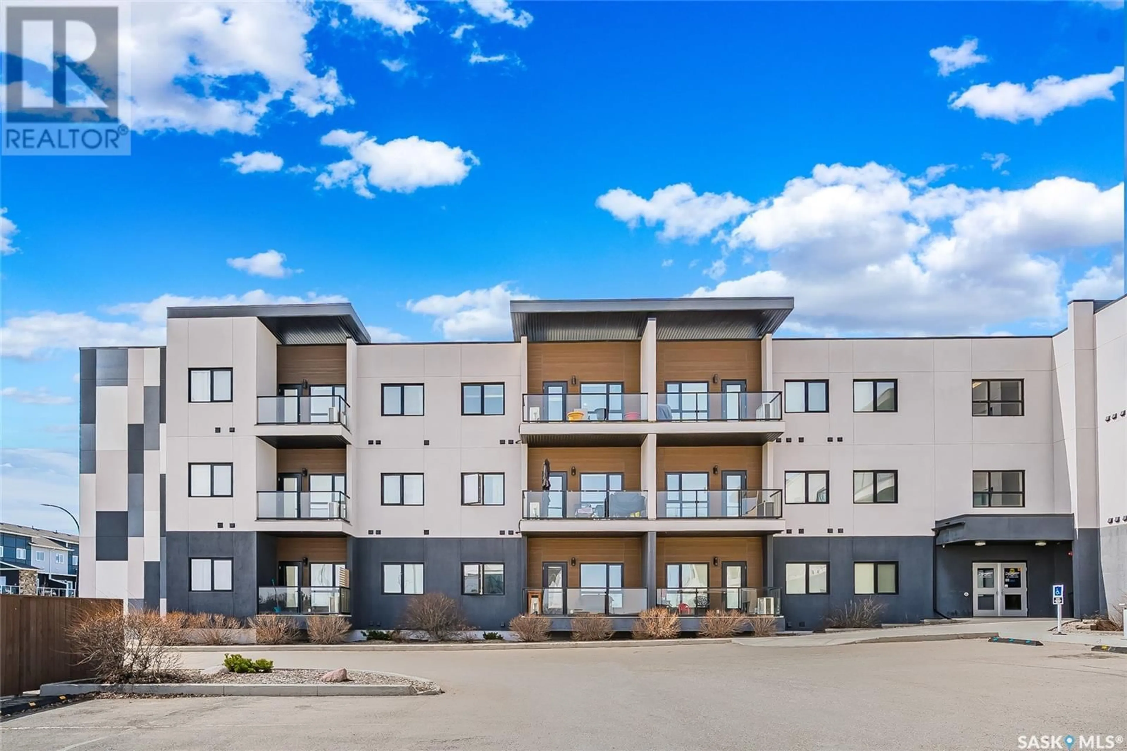 A pic from outside/outdoor area/front of a property/back of a property/a pic from drone, unknown for 219 545 HASSARD CLOSE, Saskatoon Saskatchewan S7L6V3