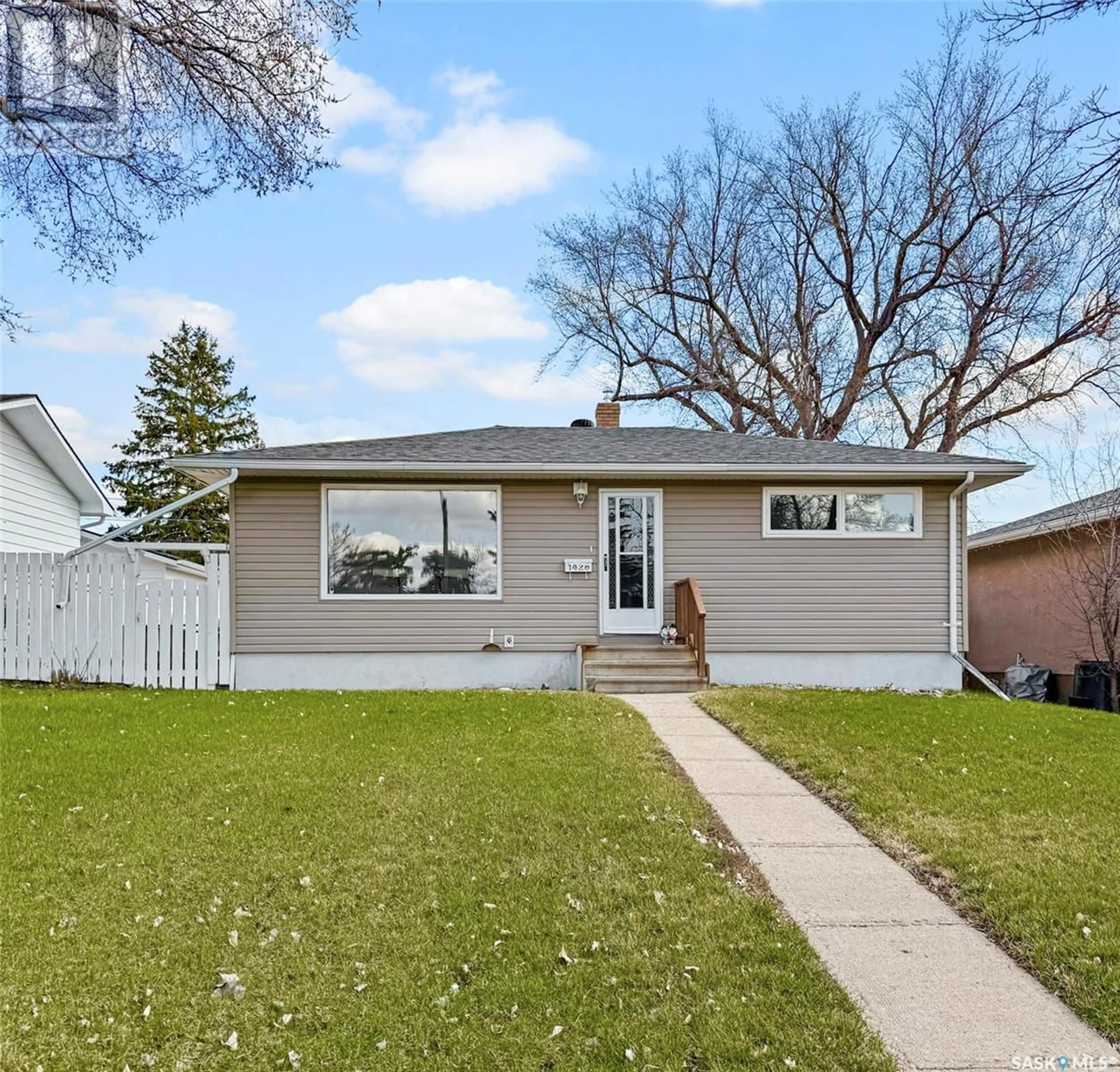 Home with vinyl exterior material, street for 1428 ASHLEY DRIVE, Swift Current Saskatchewan S9H1N5
