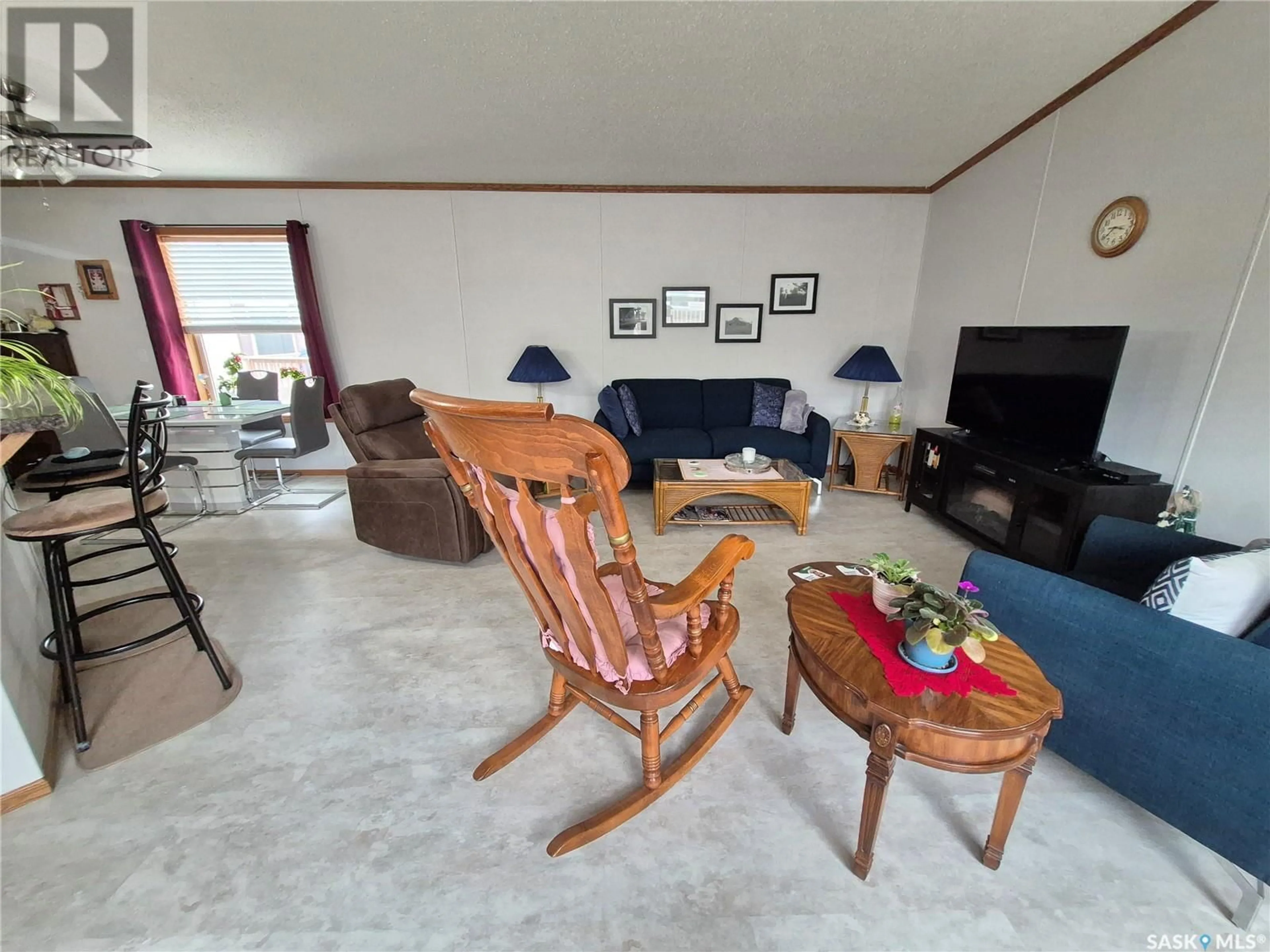 Living room with furniture, unknown for 129 1ST AVENUE, Weyburn Saskatchewan S4H2H9