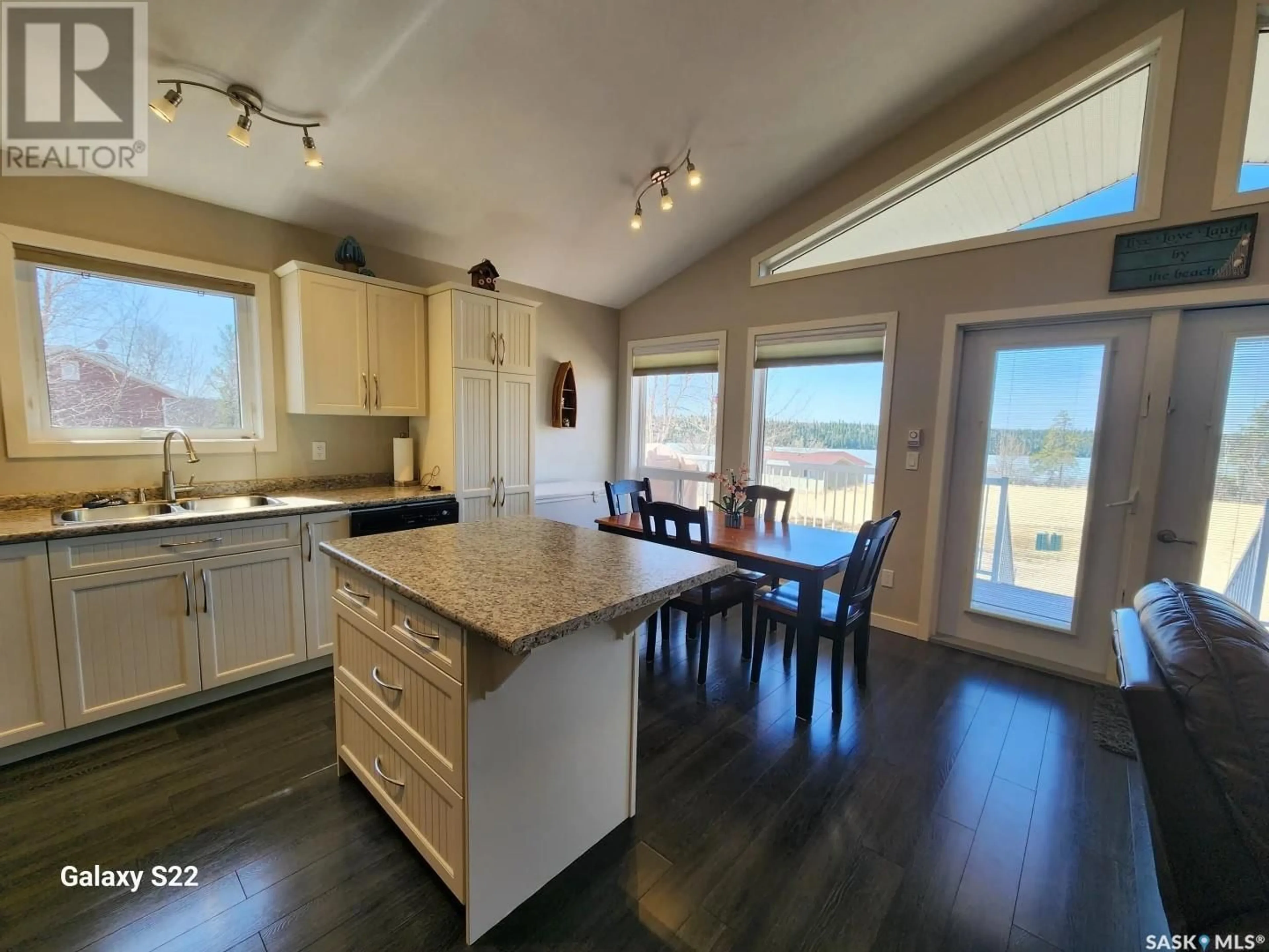 Open concept kitchen, wood/laminate floor for 29 TRANQUILITY HEIGHTS, Big River Rm No. 555 Saskatchewan S0J0E0