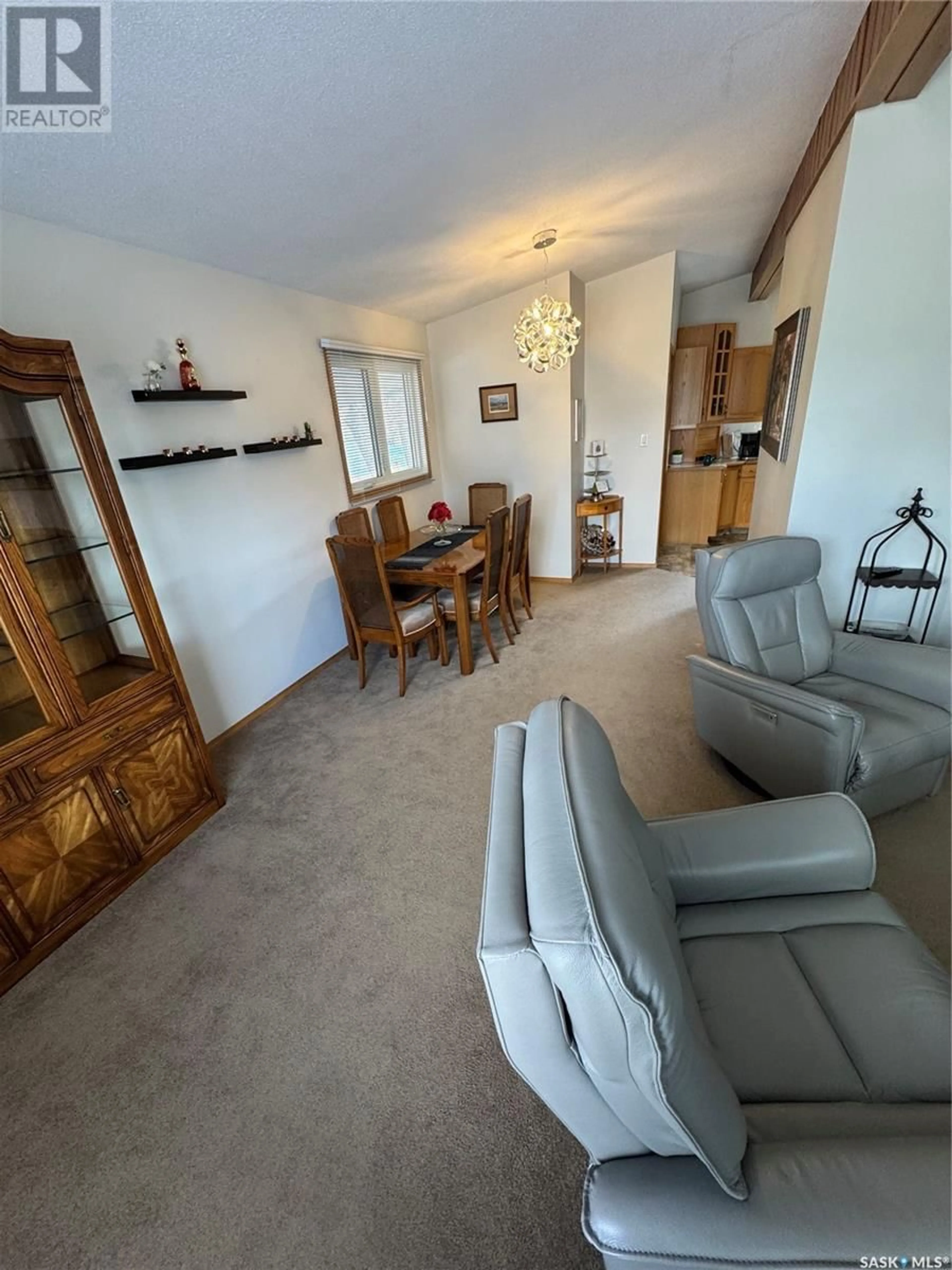 Living room with furniture, unknown for 112 ASSINIBOIA AVENUE, Assiniboia Saskatchewan S0H0B0