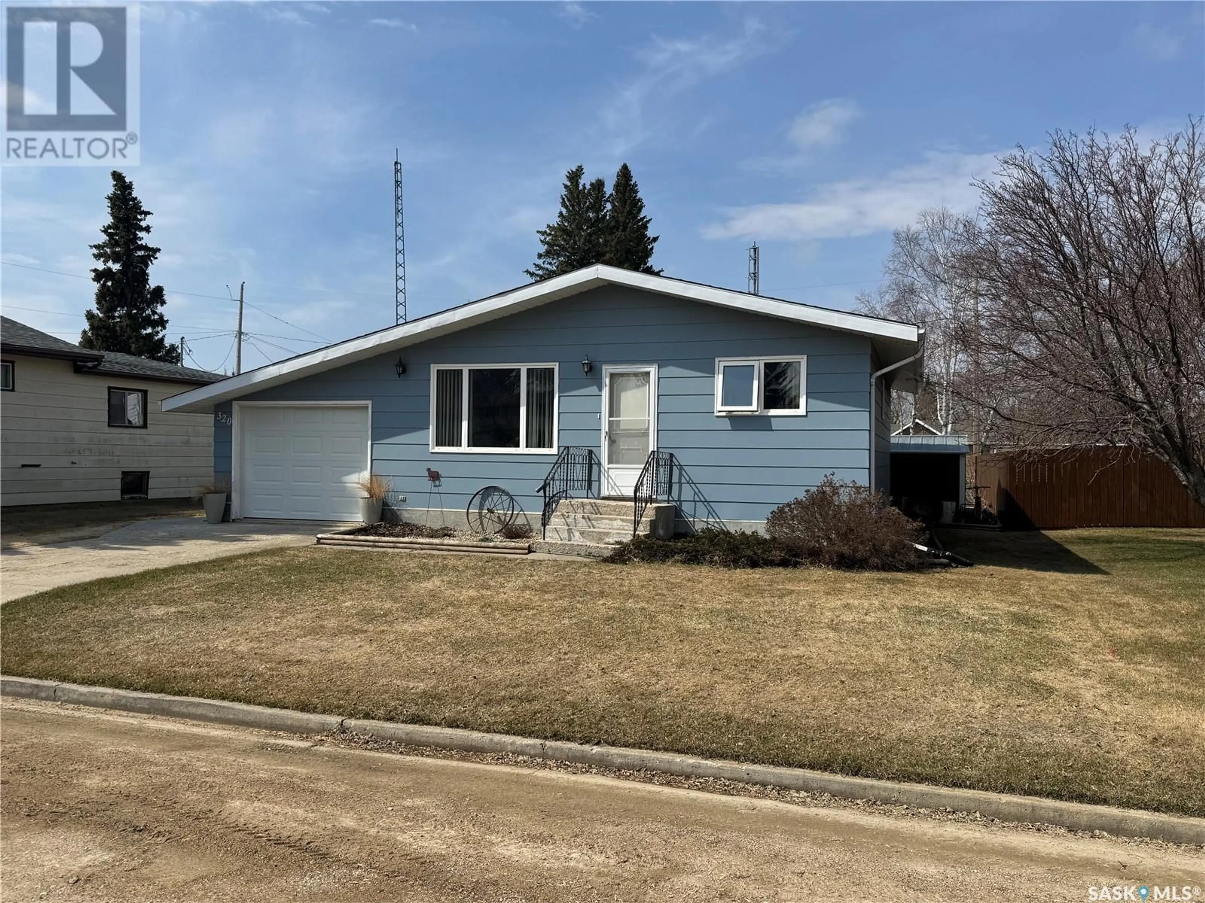 Home with vinyl exterior material, street for 320 1ST AVENUE, Englefeld Saskatchewan S0K1N0