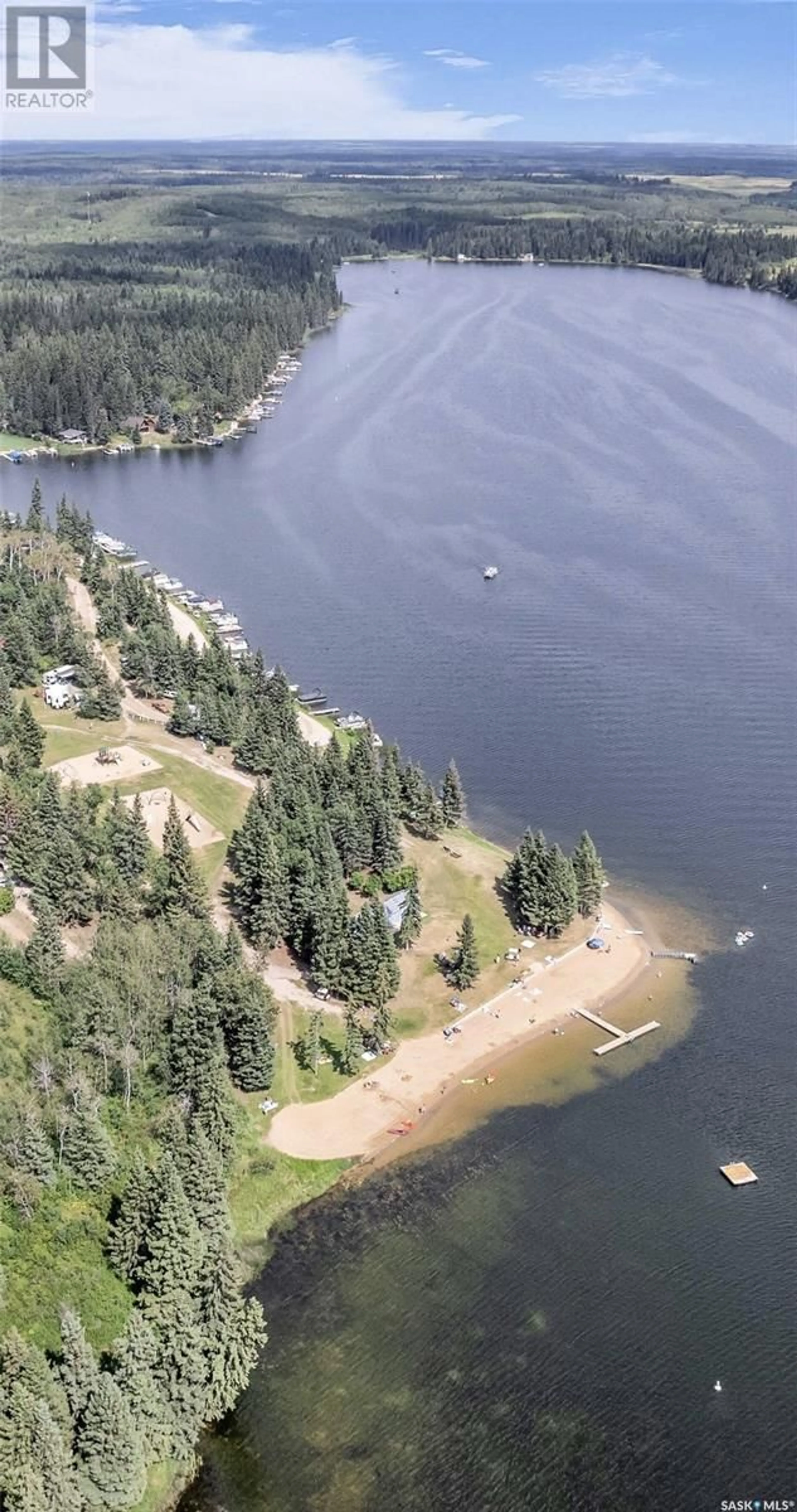 A pic from outside/outdoor area/front of a property/back of a property/a pic from drone, water/lake/river/ocean view for 110 1ST AVENUE, Shell Lake Saskatchewan S0J2G0