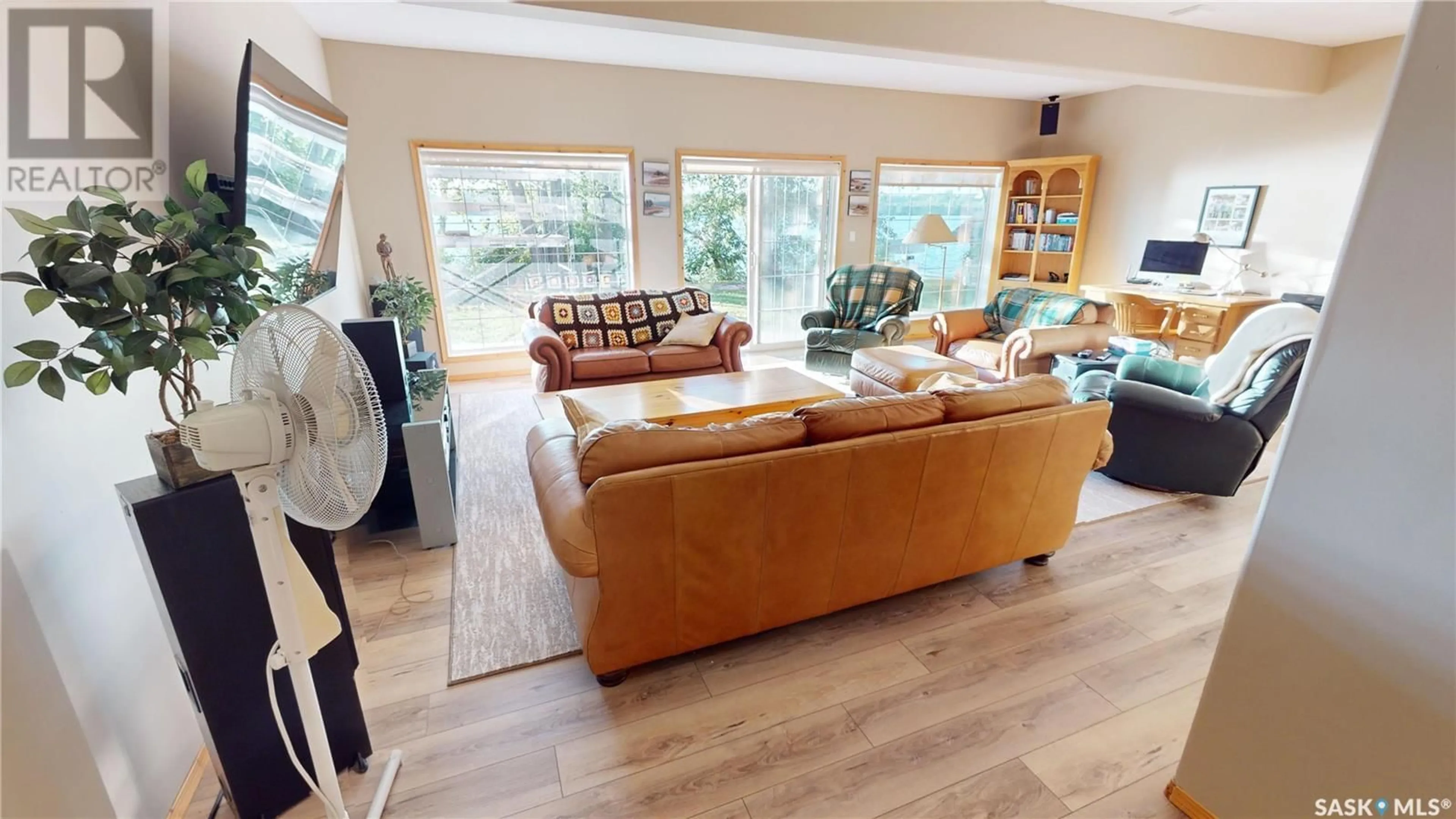 Living room with furniture, wood/laminate floor for Blk 1 Lots 11&12 - 1 POINT DRIVE, Wakaw Lake Saskatchewan S0K4P0