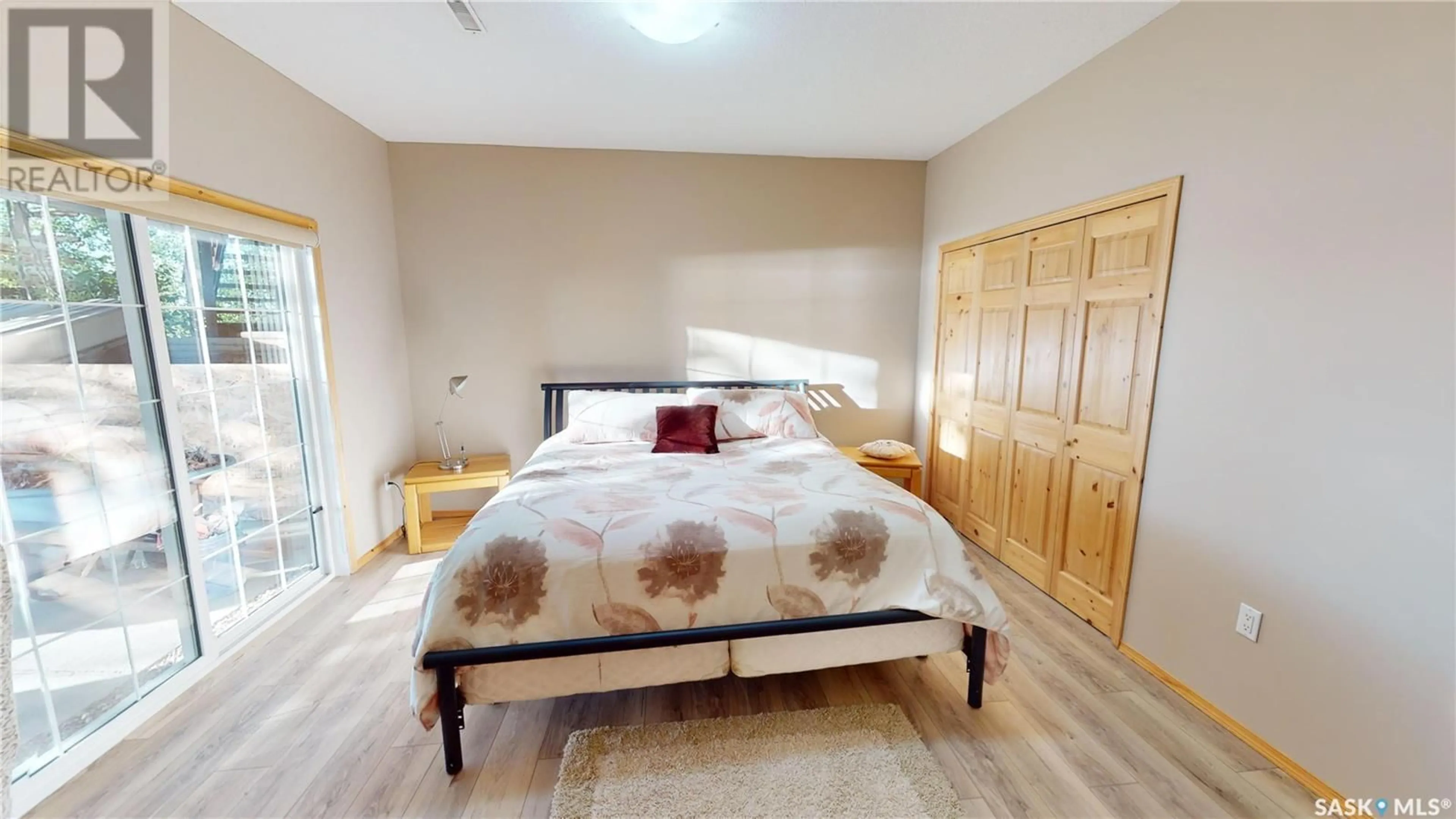 Bedroom with bed, wood/laminate floor for Blk 1 Lots 11&12 - 1 POINT DRIVE, Wakaw Lake Saskatchewan S0K4P0
