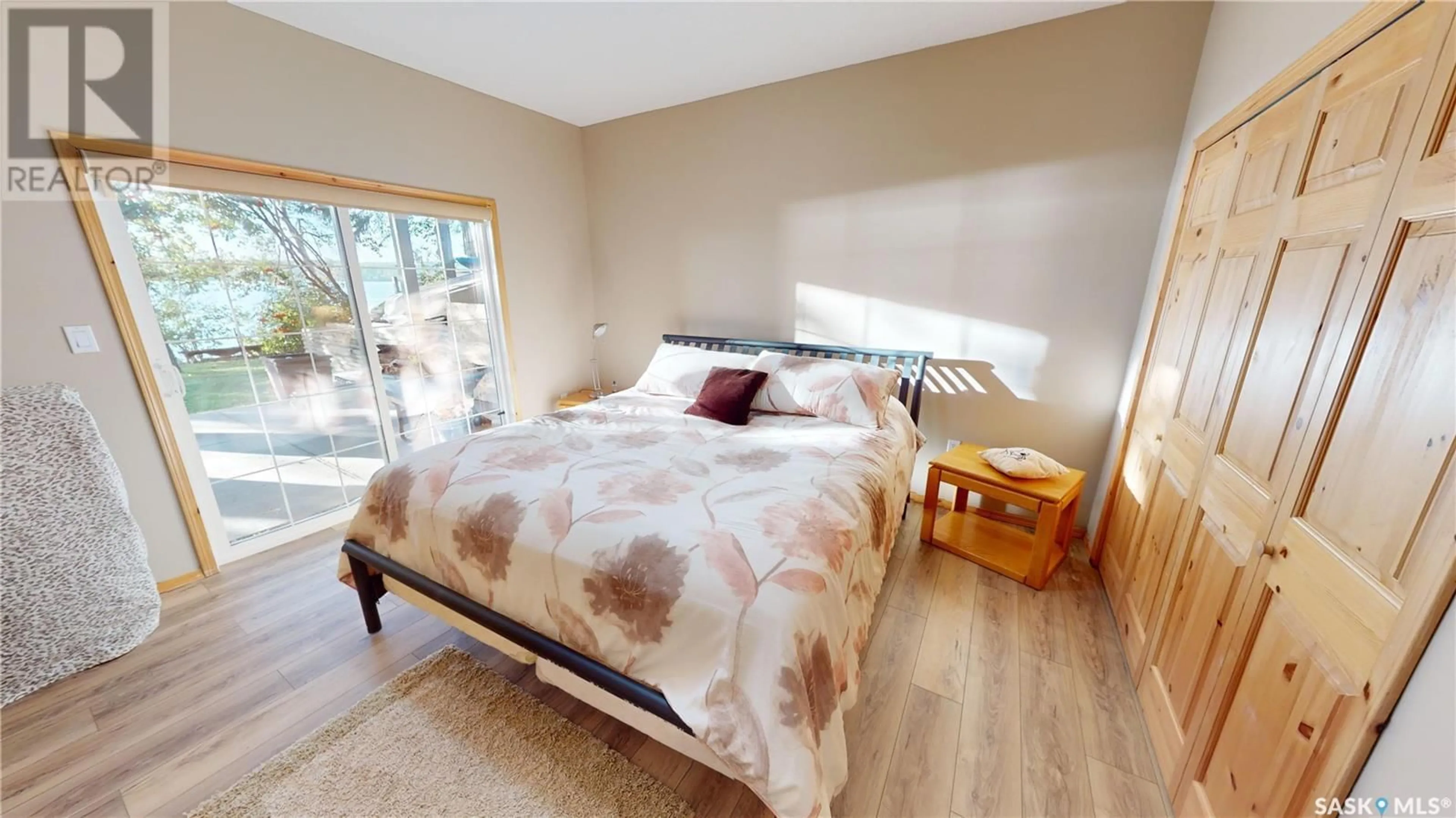 Bedroom with bed, wood/laminate floor for Blk 1 Lots 11&12 - 1 POINT DRIVE, Wakaw Lake Saskatchewan S0K4P0