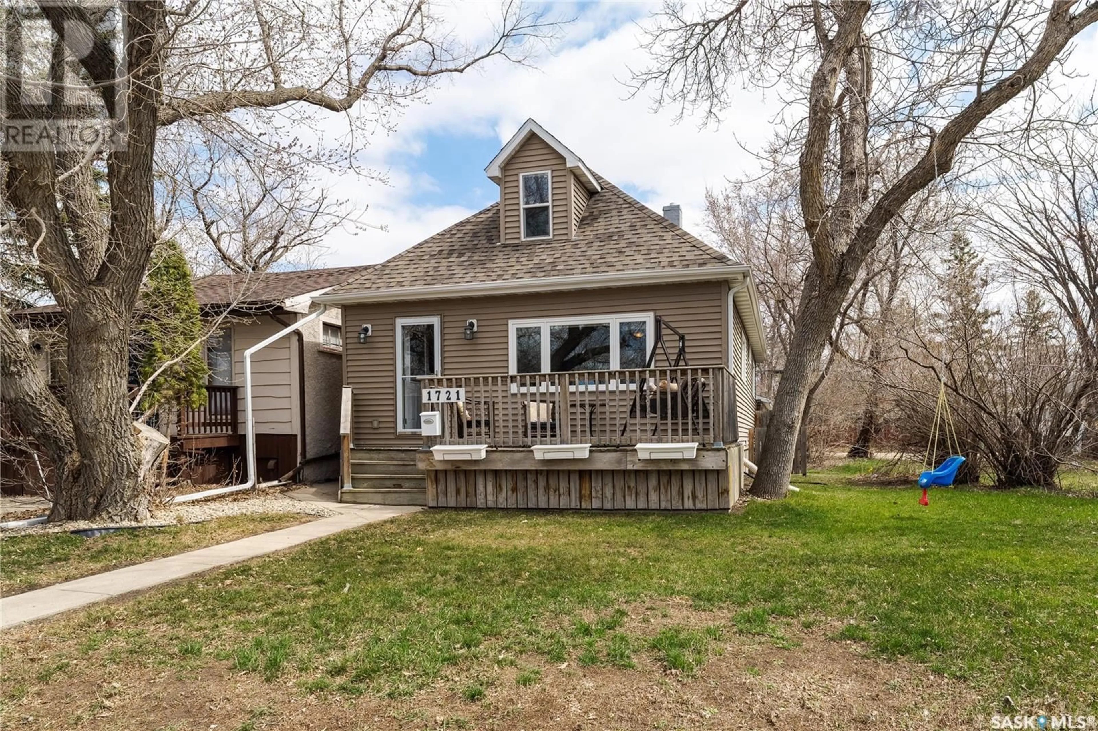 Home with vinyl exterior material, street for 1721 CONNAUGHT STREET, Regina Saskatchewan S4T4T3