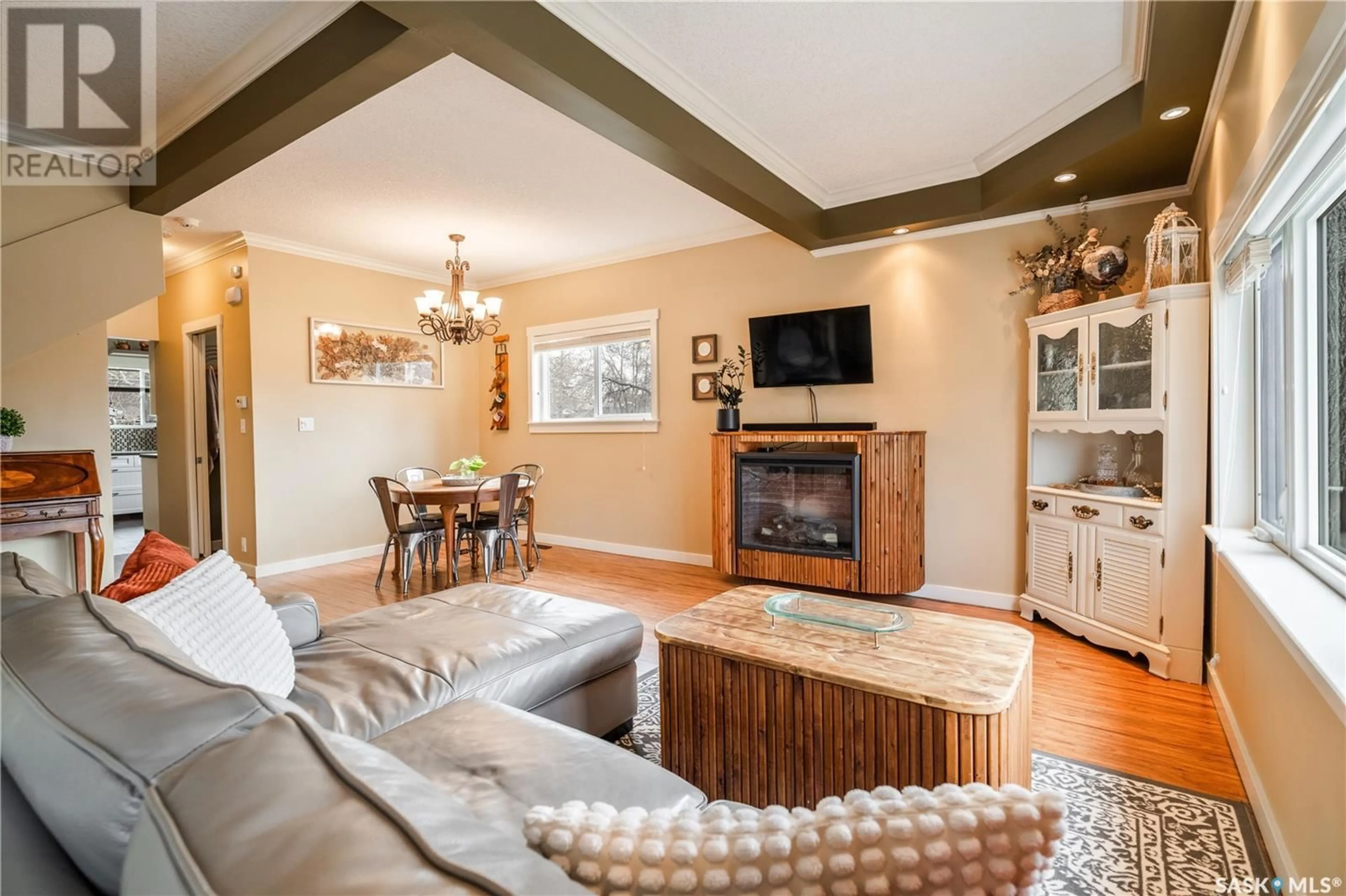 Living room with furniture, wood/laminate floor for 1721 CONNAUGHT STREET, Regina Saskatchewan S4T4T3