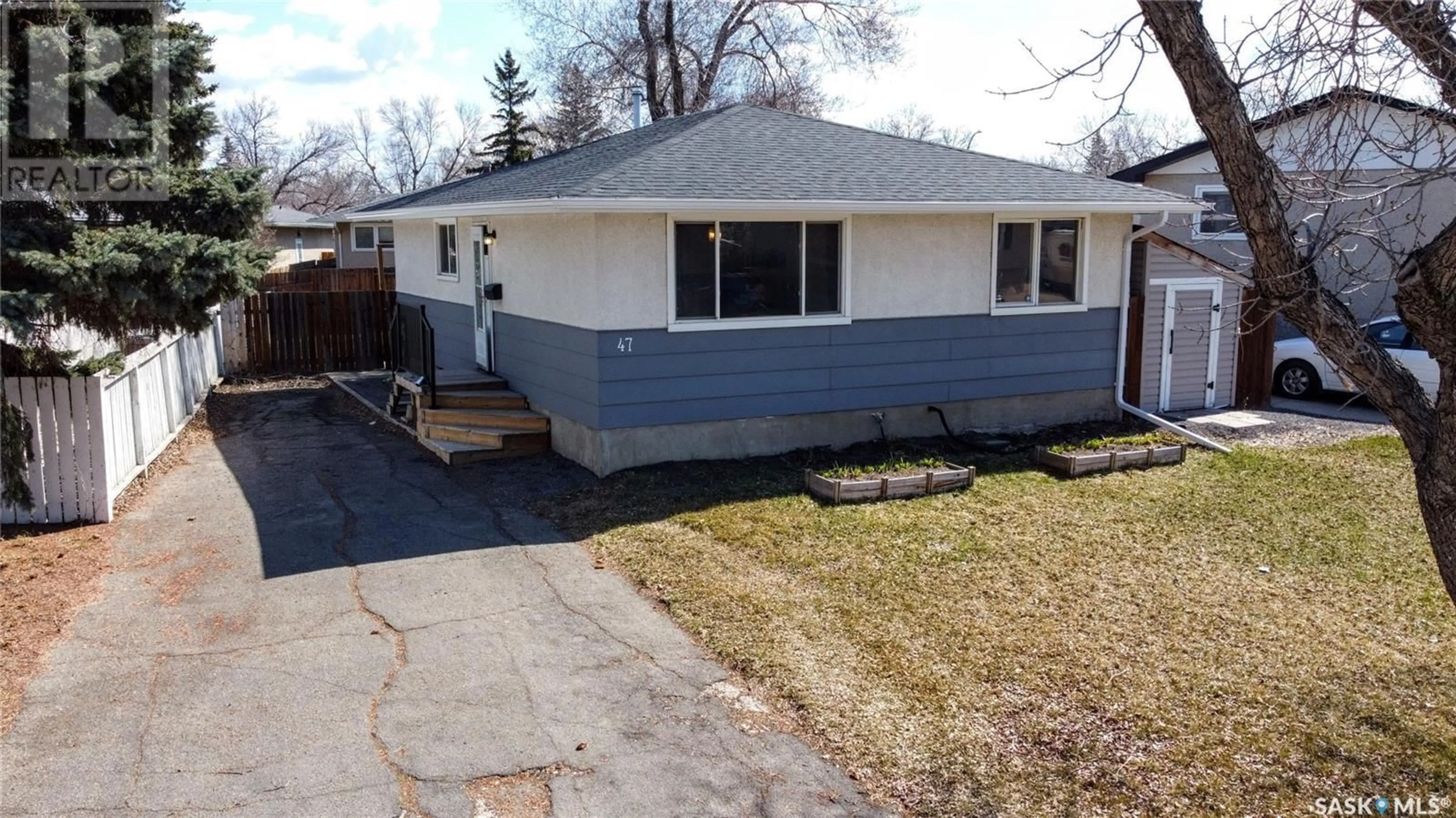 Home with vinyl exterior material, street for 47 LLOYD CRESCENT, Regina Saskatchewan S4R6B8