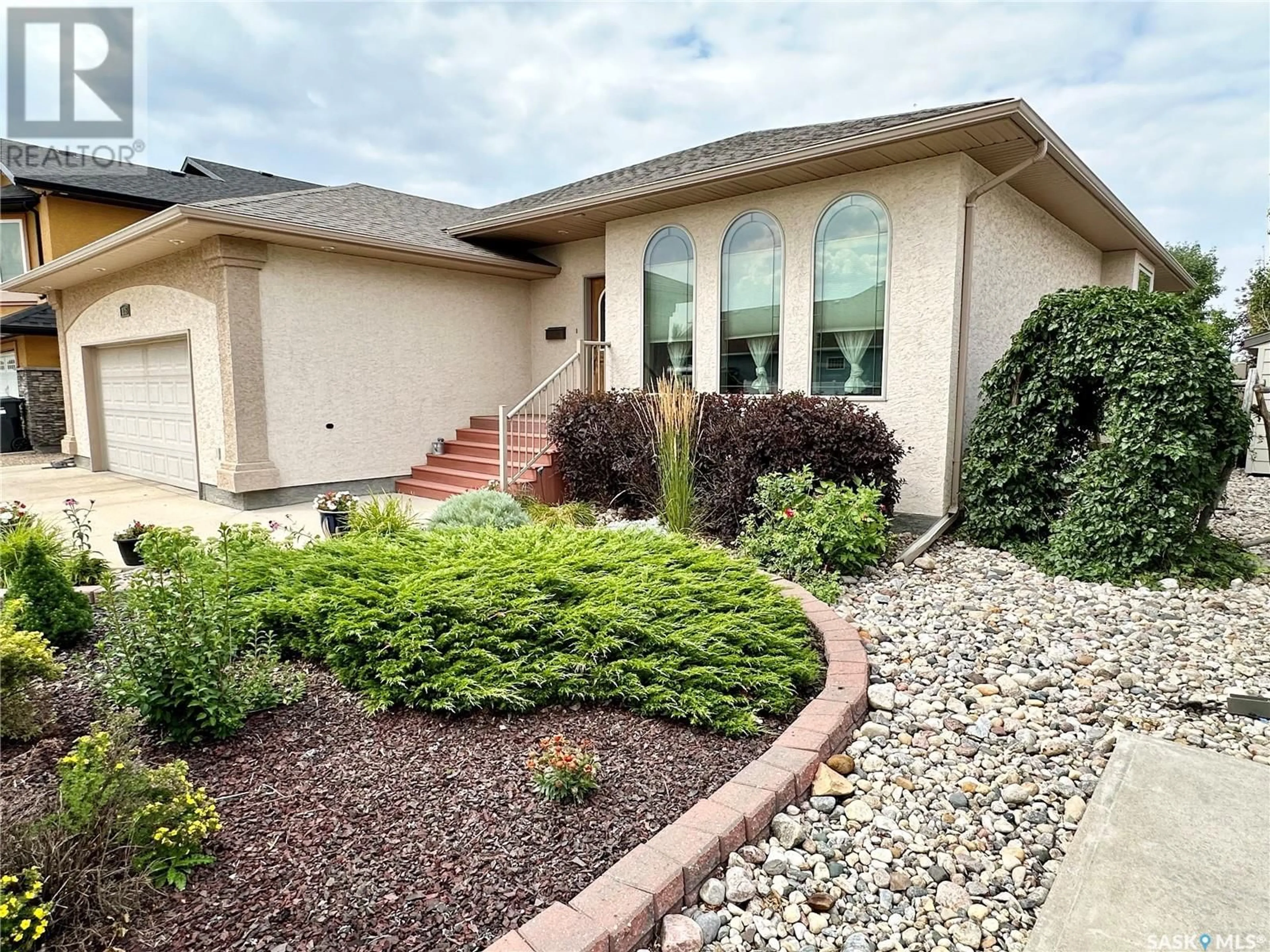 Home with brick exterior material, street for 1815 GORDON MILES PLACE, Weyburn Saskatchewan S4H0B9