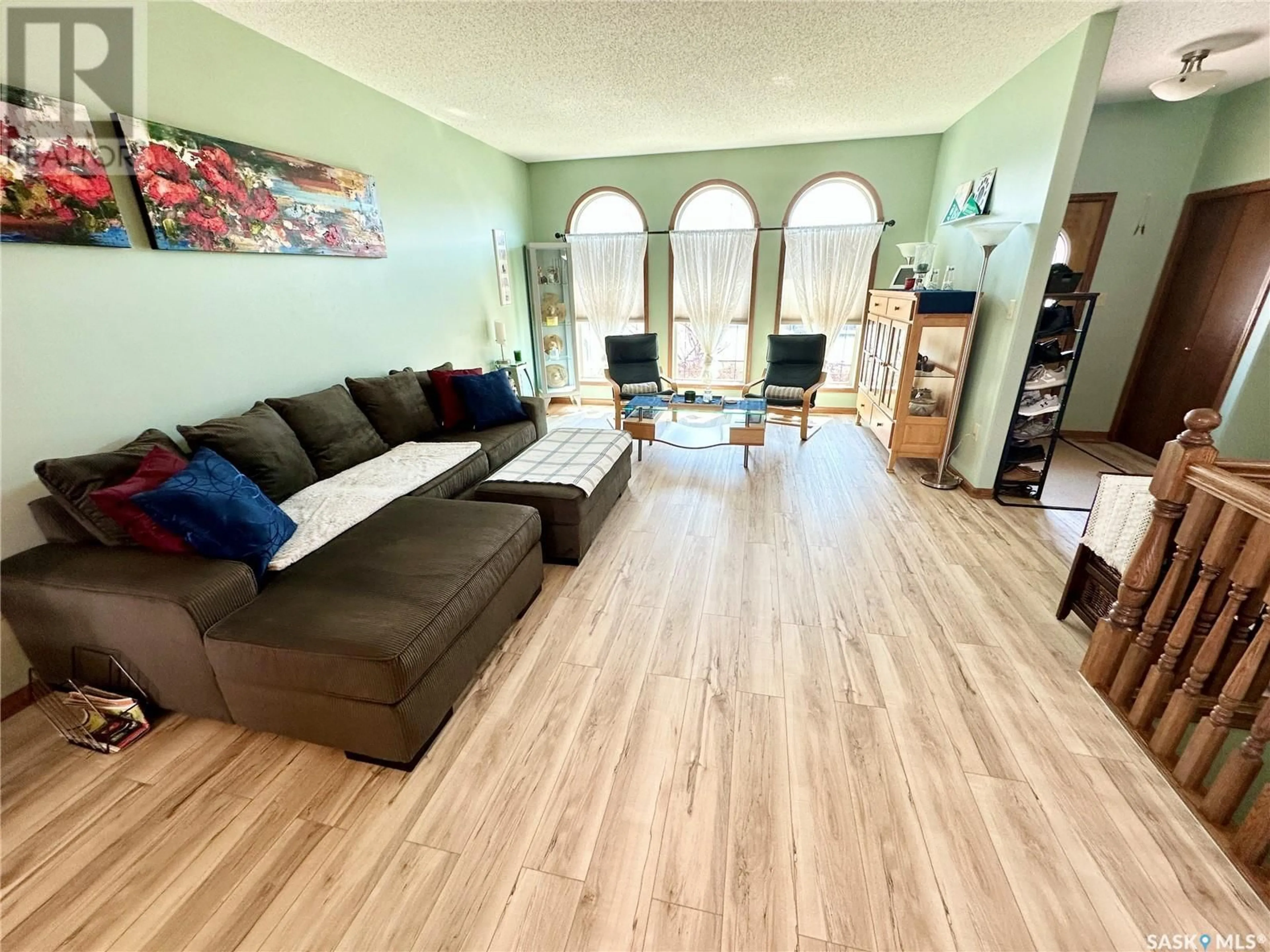 Living room with furniture, unknown for 1815 GORDON MILES PLACE, Weyburn Saskatchewan S4H0B9