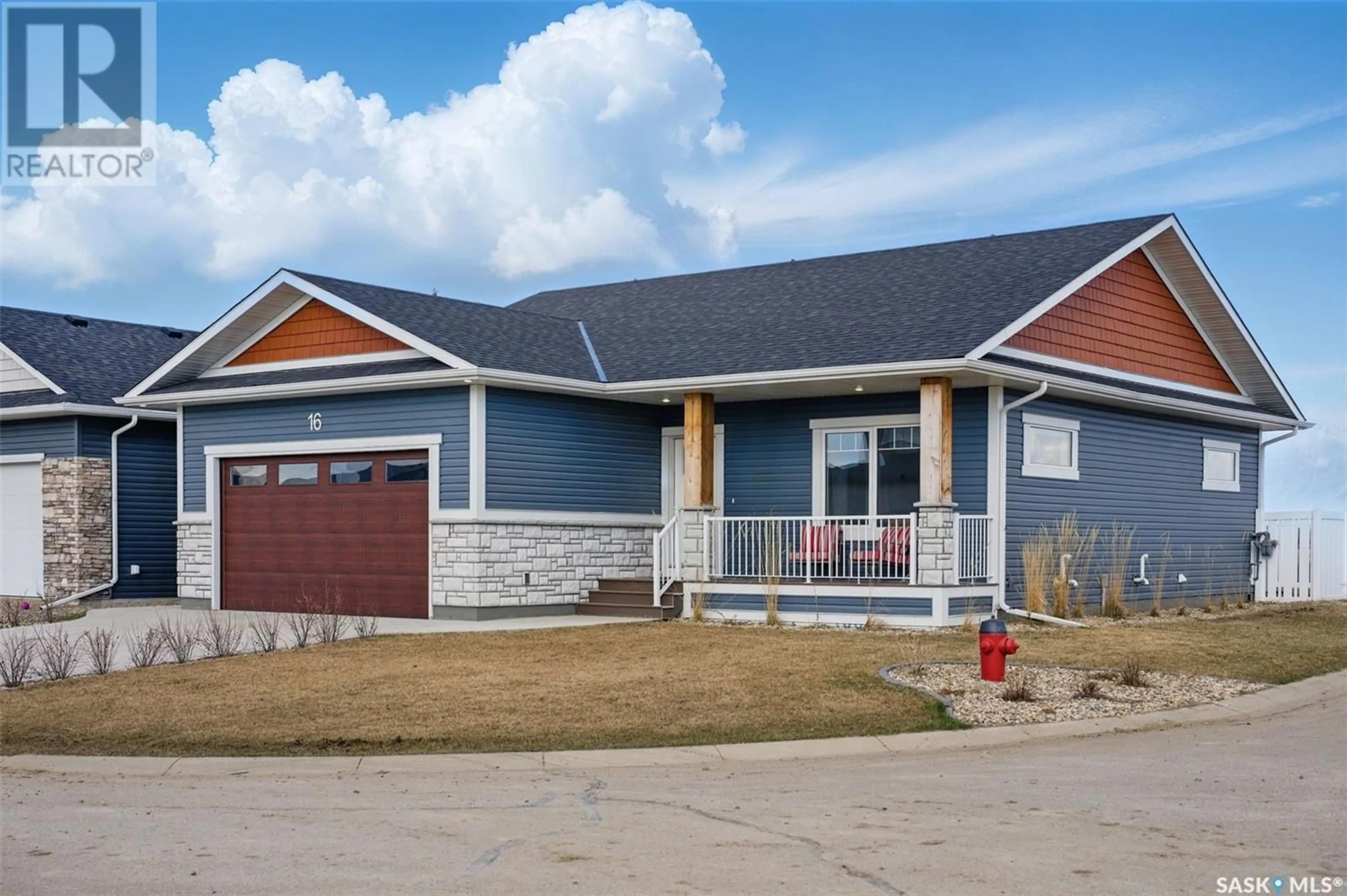 Home with vinyl exterior material, street for 16 WALKER WAY, Clavet Saskatchewan S0K0Y0