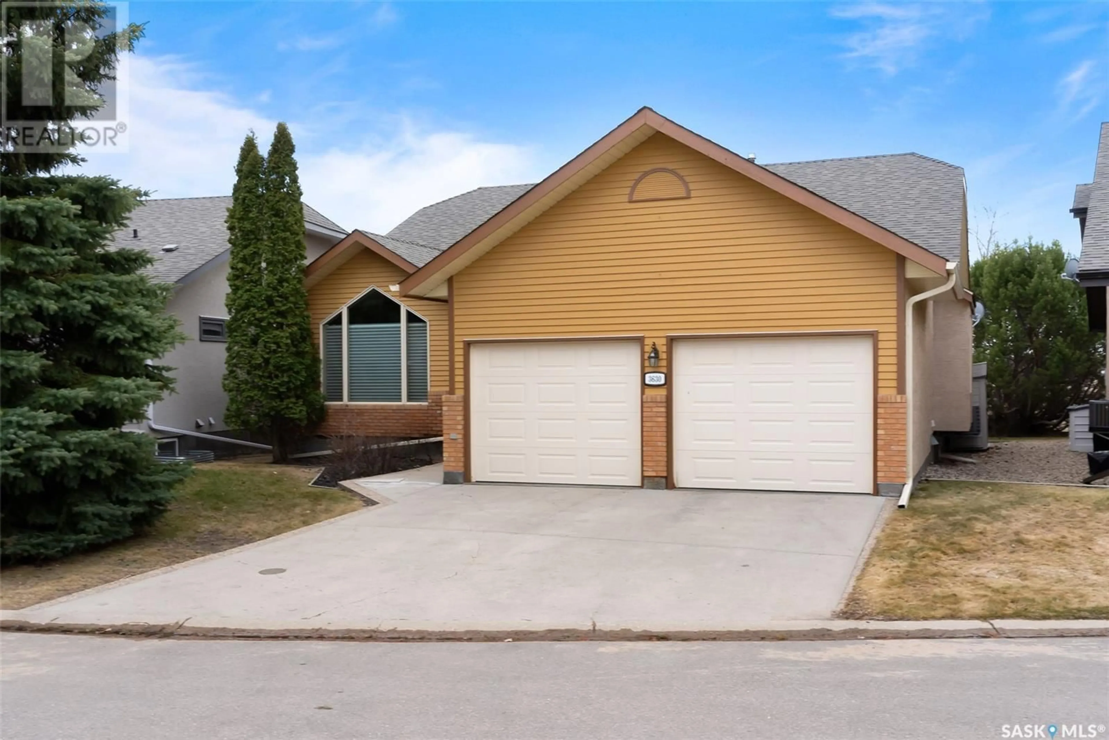 Home with vinyl exterior material, street for 3630 WEDGWOOD WAY, Regina Saskatchewan S4V2M5