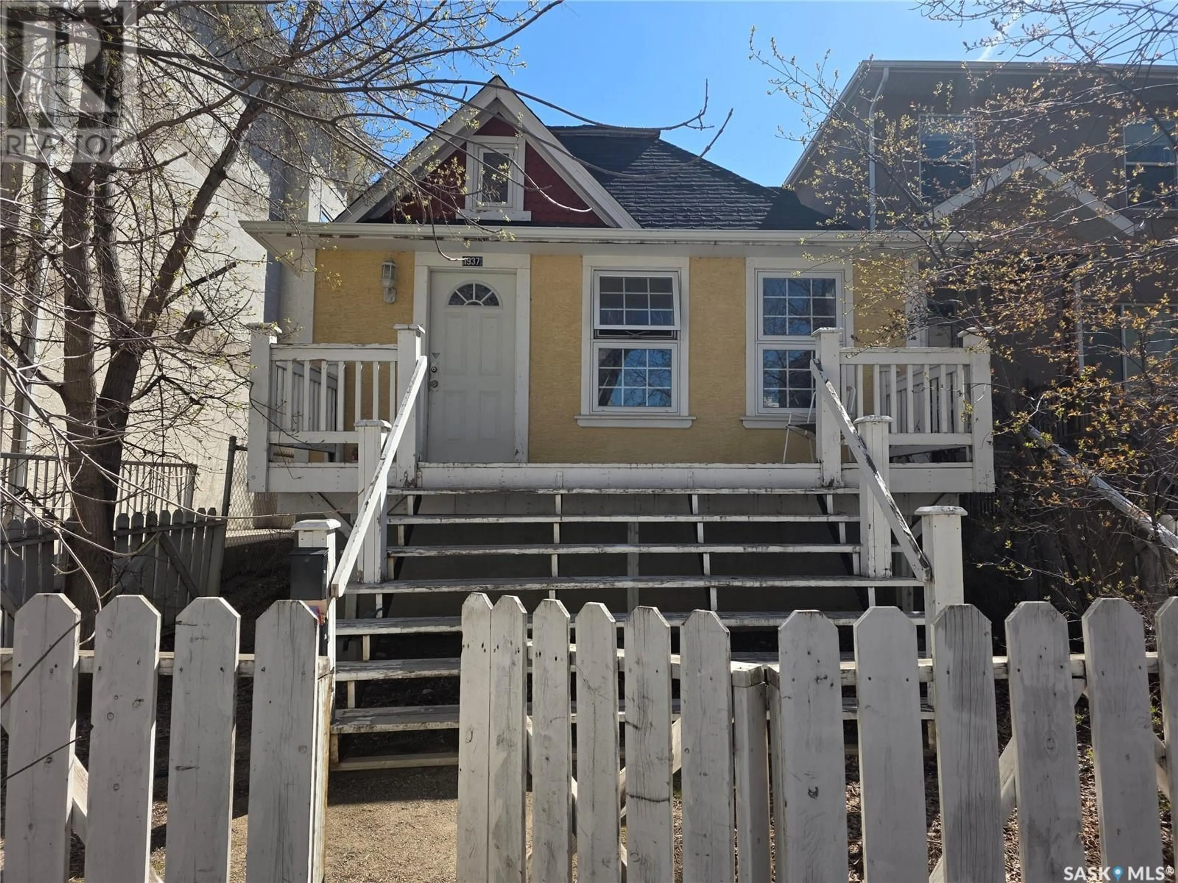 Home with vinyl exterior material, street for 1937 HALIFAX STREET, Regina Saskatchewan S4P1T6