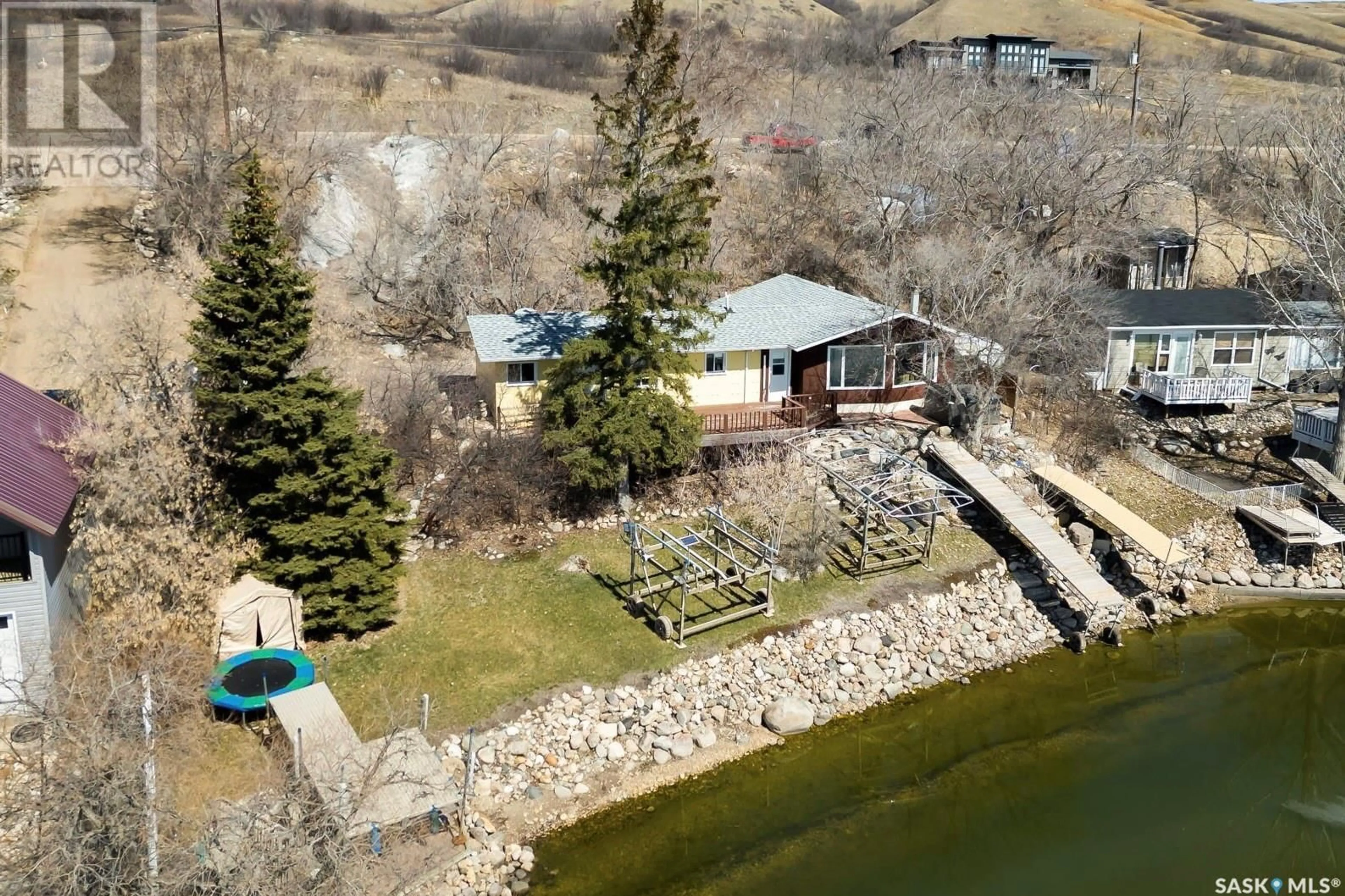 A pic from outside/outdoor area/front of a property/back of a property/a pic from drone, water/lake/river/ocean view for 446 PASQUA LAKE ROAD, Pasqua Lake Saskatchewan S0G1S0