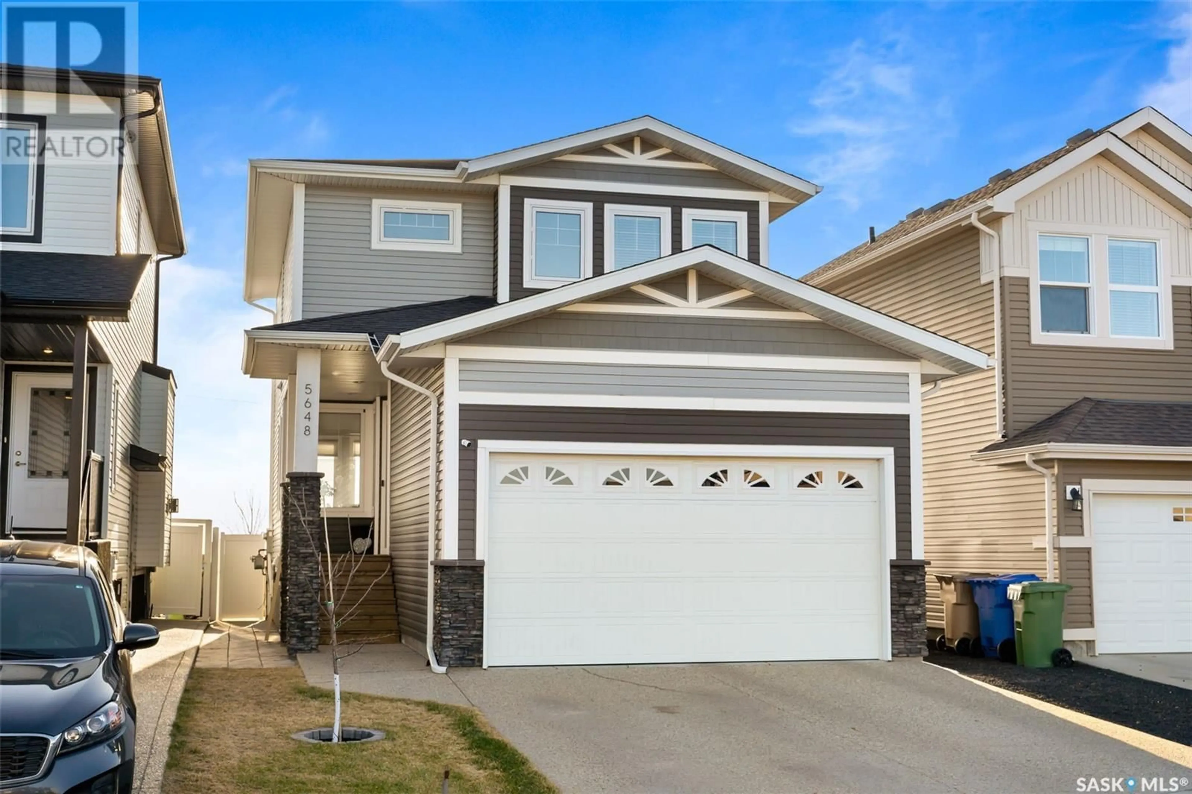 Home with vinyl exterior material, street for 5648 PEARSALL CRESCENT, Regina Saskatchewan S4W0K2
