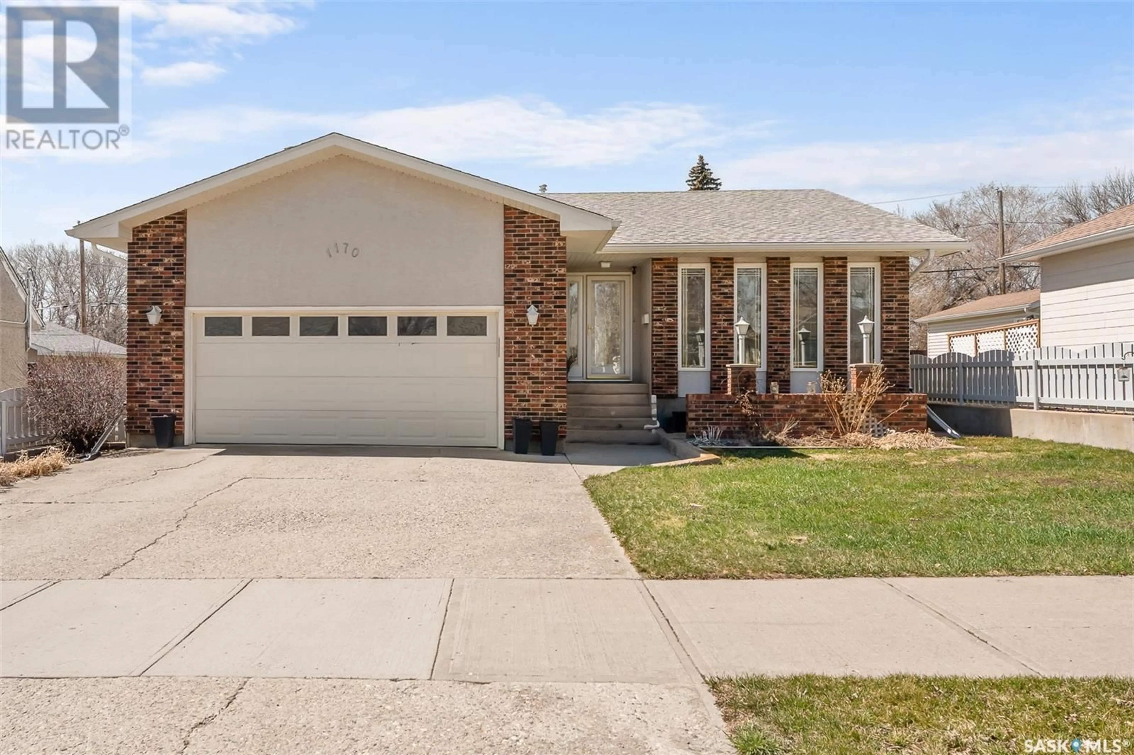 Home with vinyl exterior material, street for 1170 WOLFE AVENUE, Moose Jaw Saskatchewan S6H1K1