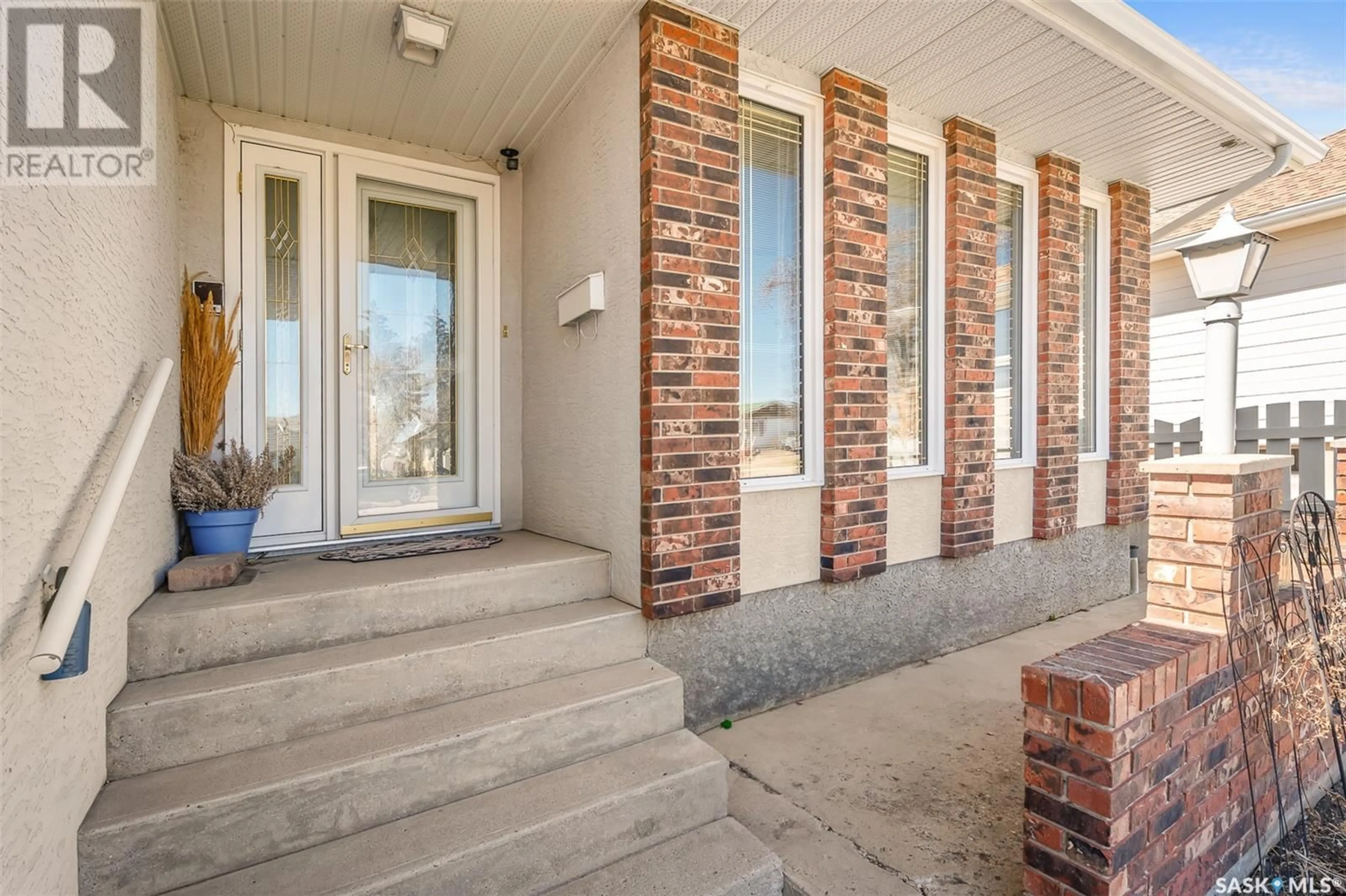 Home with brick exterior material, street for 1170 WOLFE AVENUE, Moose Jaw Saskatchewan S6H1K1