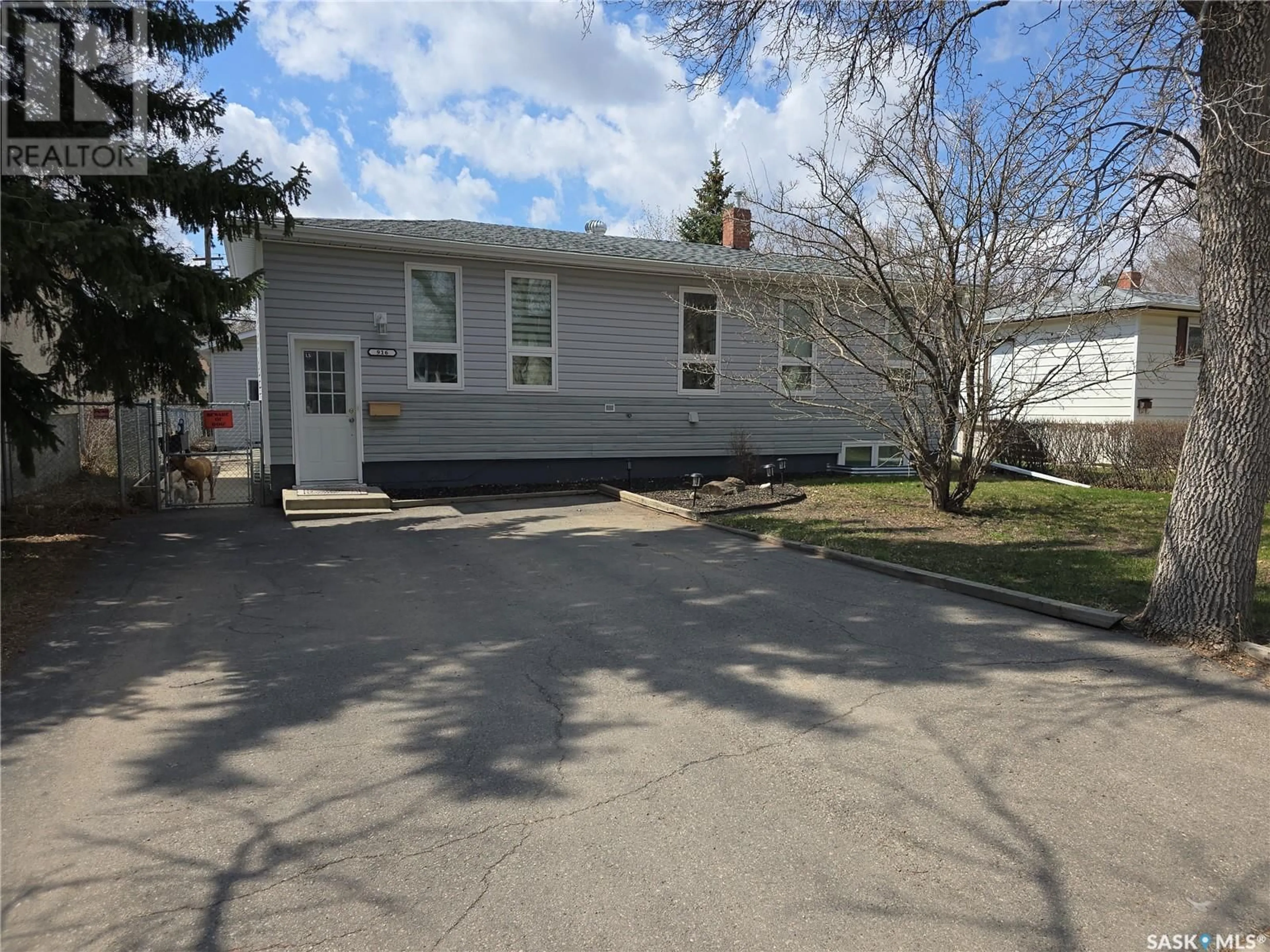 Home with vinyl exterior material, street for 916 FORGET STREET, Regina Saskatchewan S4T4X6