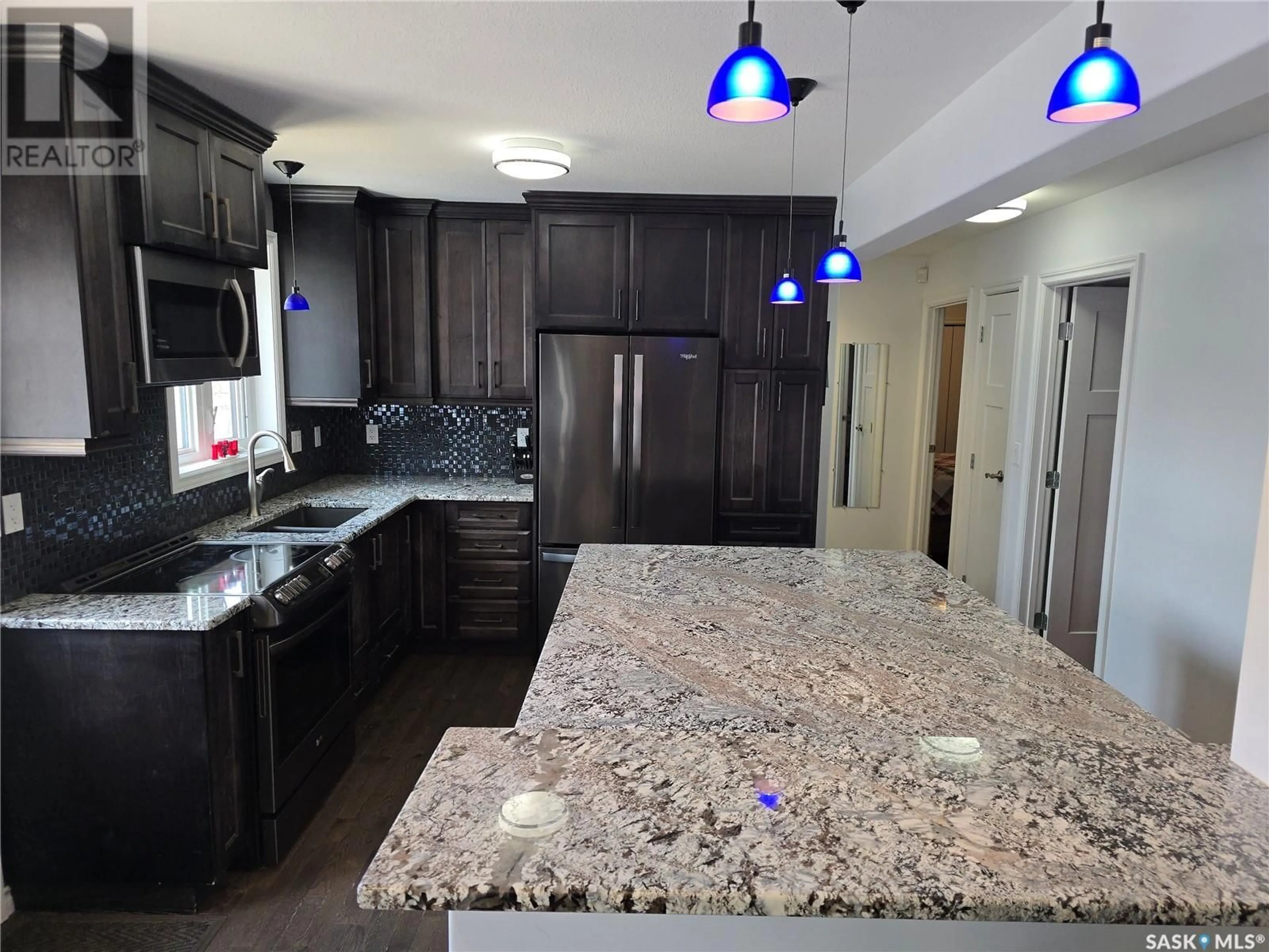 Open concept kitchen, ceramic/tile floor for 916 FORGET STREET, Regina Saskatchewan S4T4X6