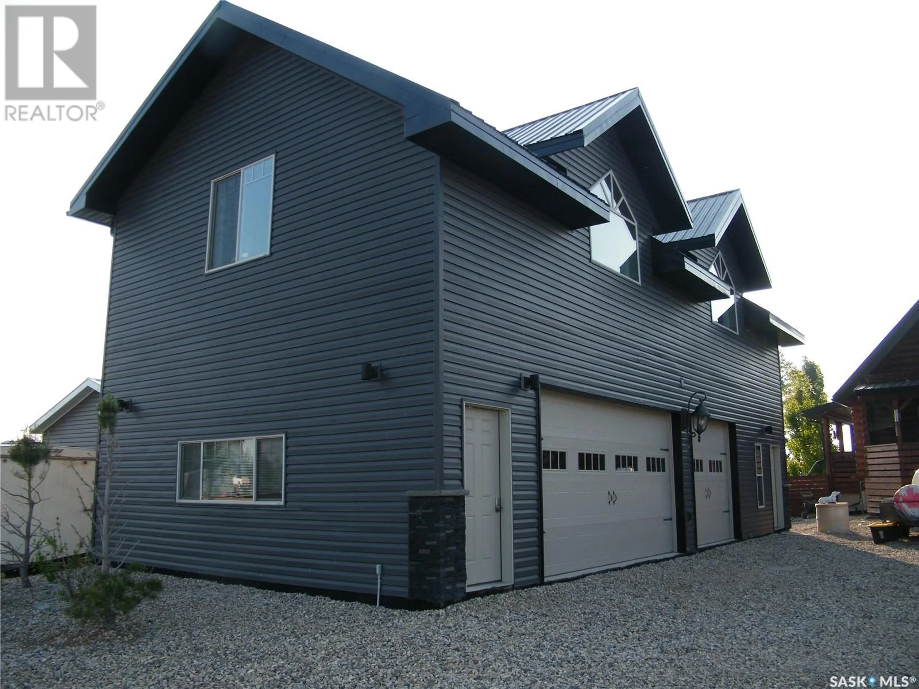 Home with vinyl exterior material, street for 43 LAKESHORE DRIVE, Three Lakes Rm No. 400 Saskatchewan S0K2X0