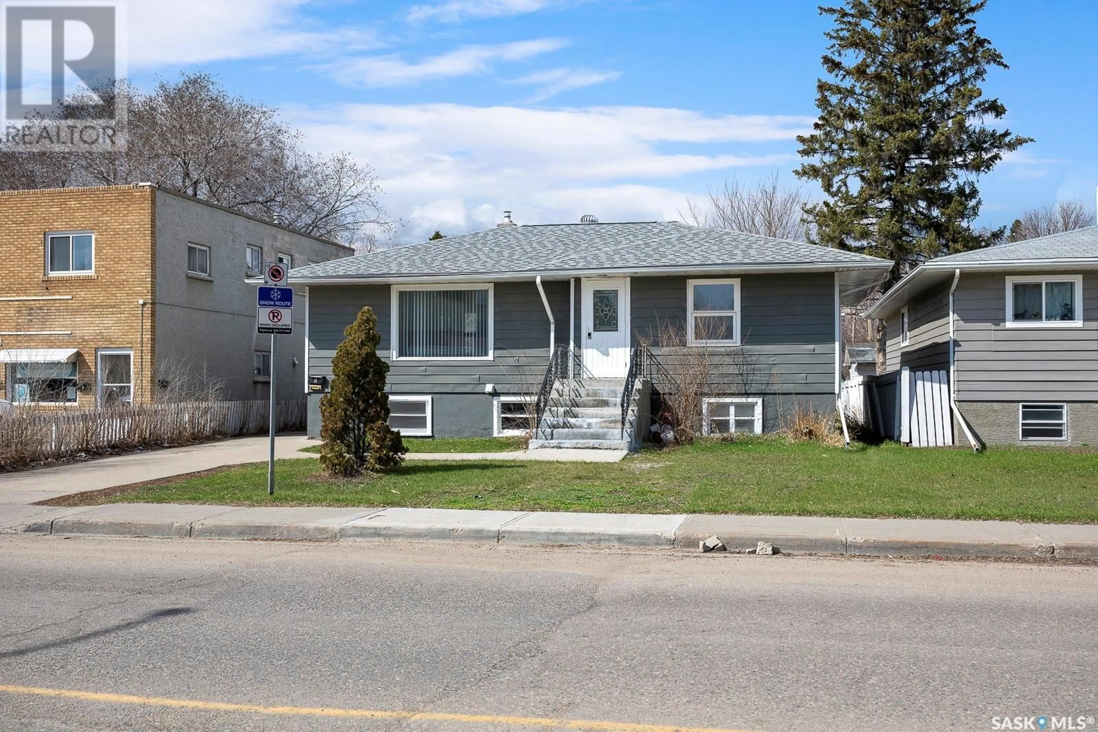 Home with vinyl exterior material, street for 222 COLLEGE AVENUE, Regina Saskatchewan S4N0V6