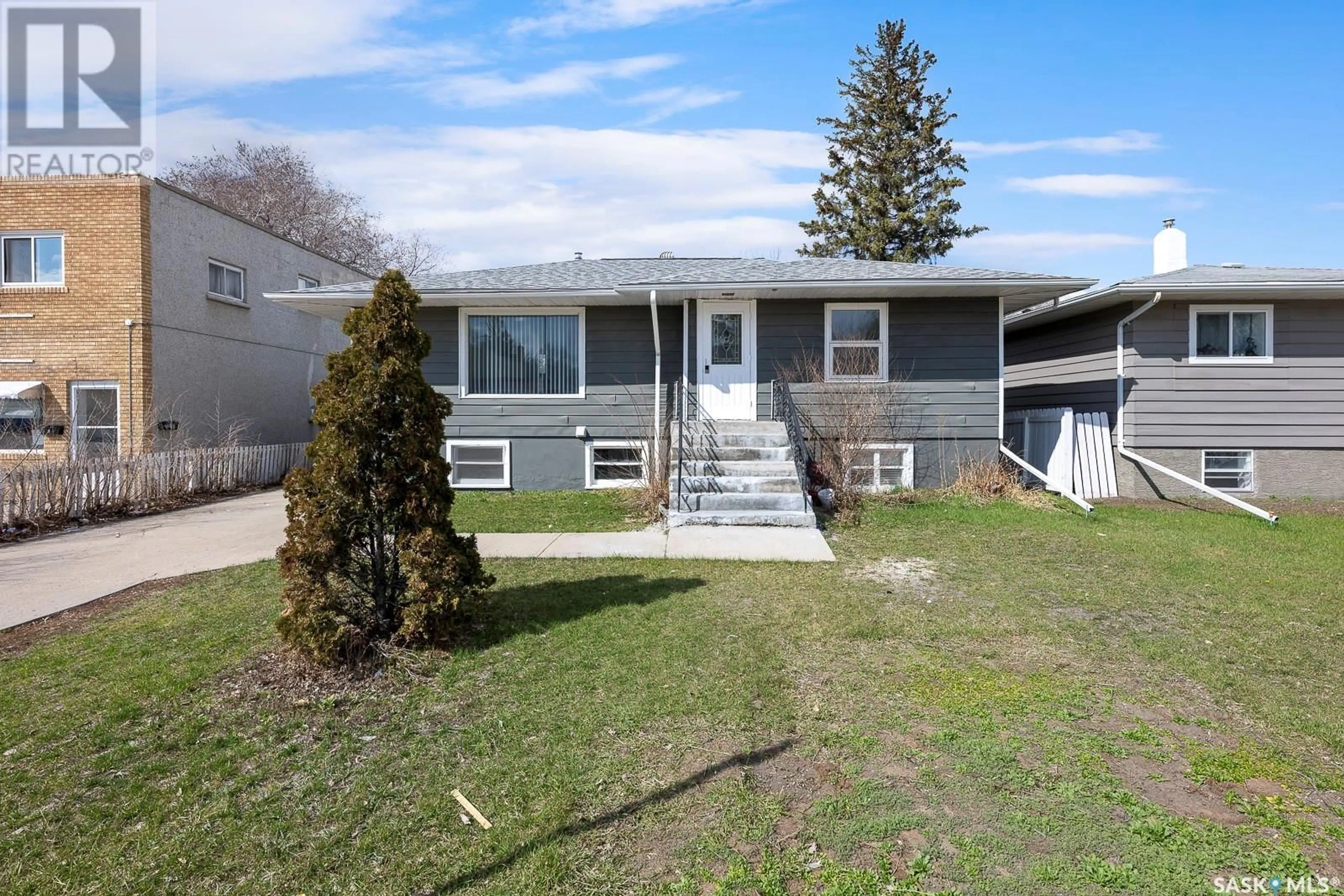 Home with vinyl exterior material, street for 222 COLLEGE AVENUE, Regina Saskatchewan S4N0V6