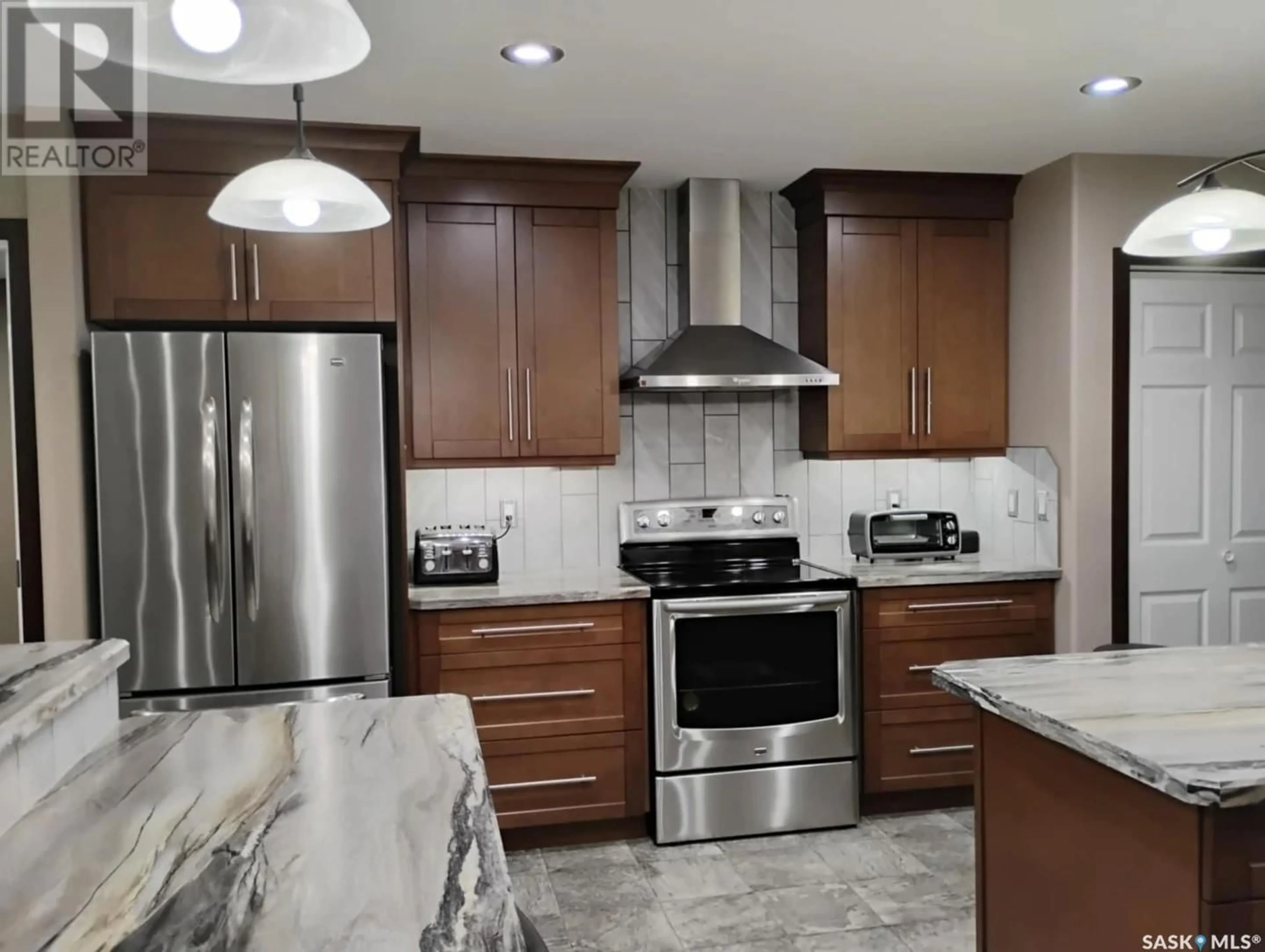 Contemporary kitchen, ceramic/tile floor for 309 DOUGLAS AVENUE, Orkney Rm No. 244 Saskatchewan S3N4K1